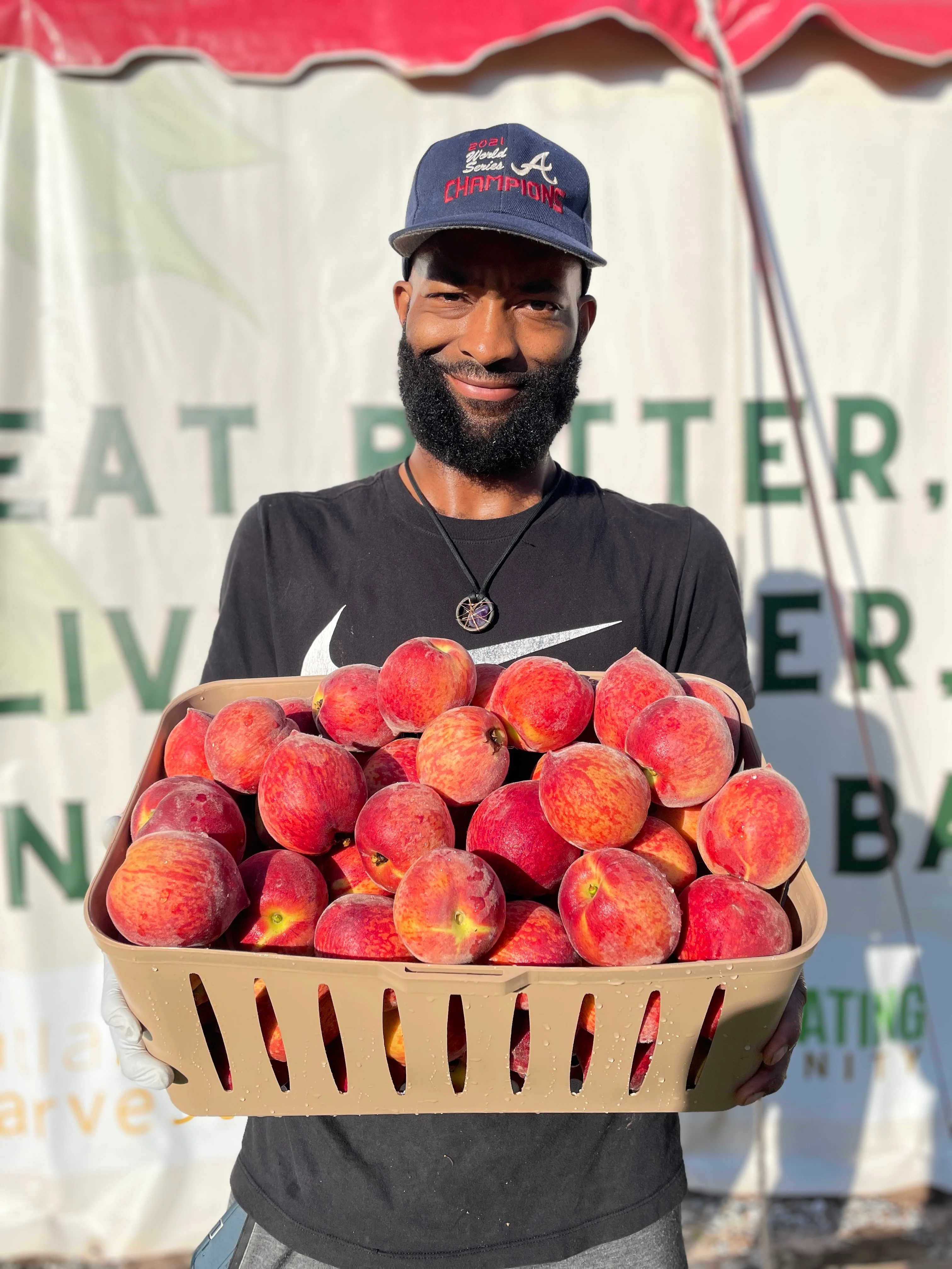 Freshly harvested apples in a basket at a farm market