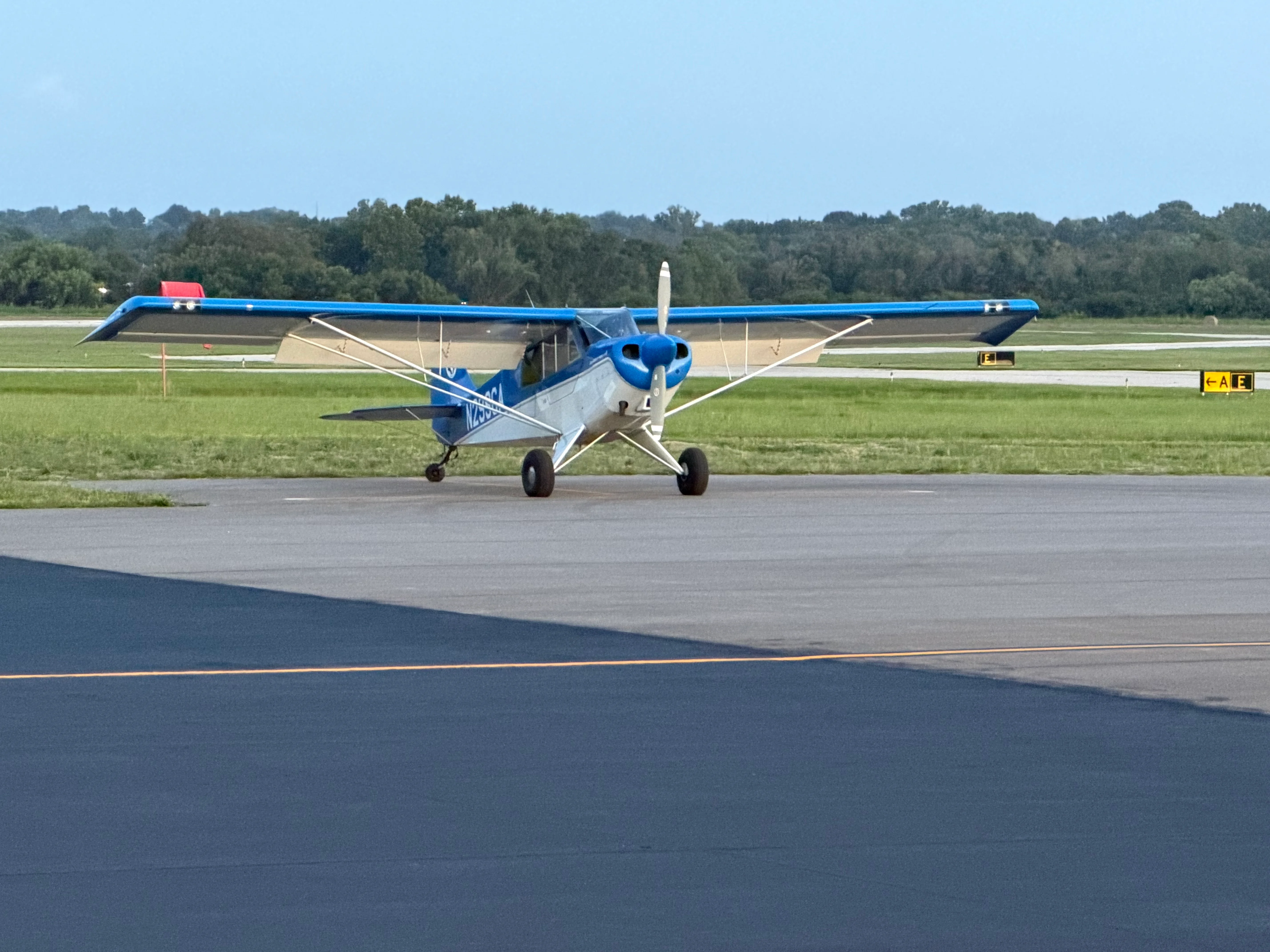Light aircraft on the runway at an airport