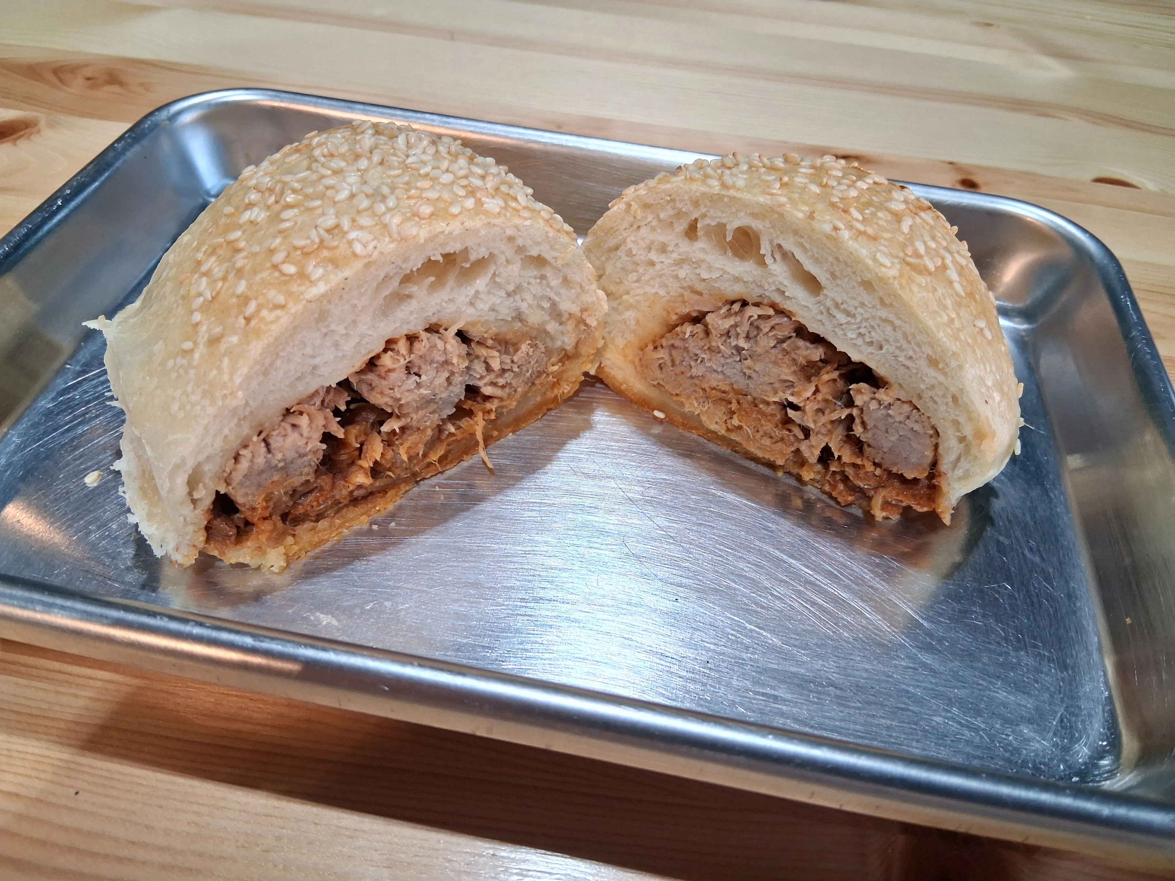 Savory pork bun with sesame crust, a popular Asian street food