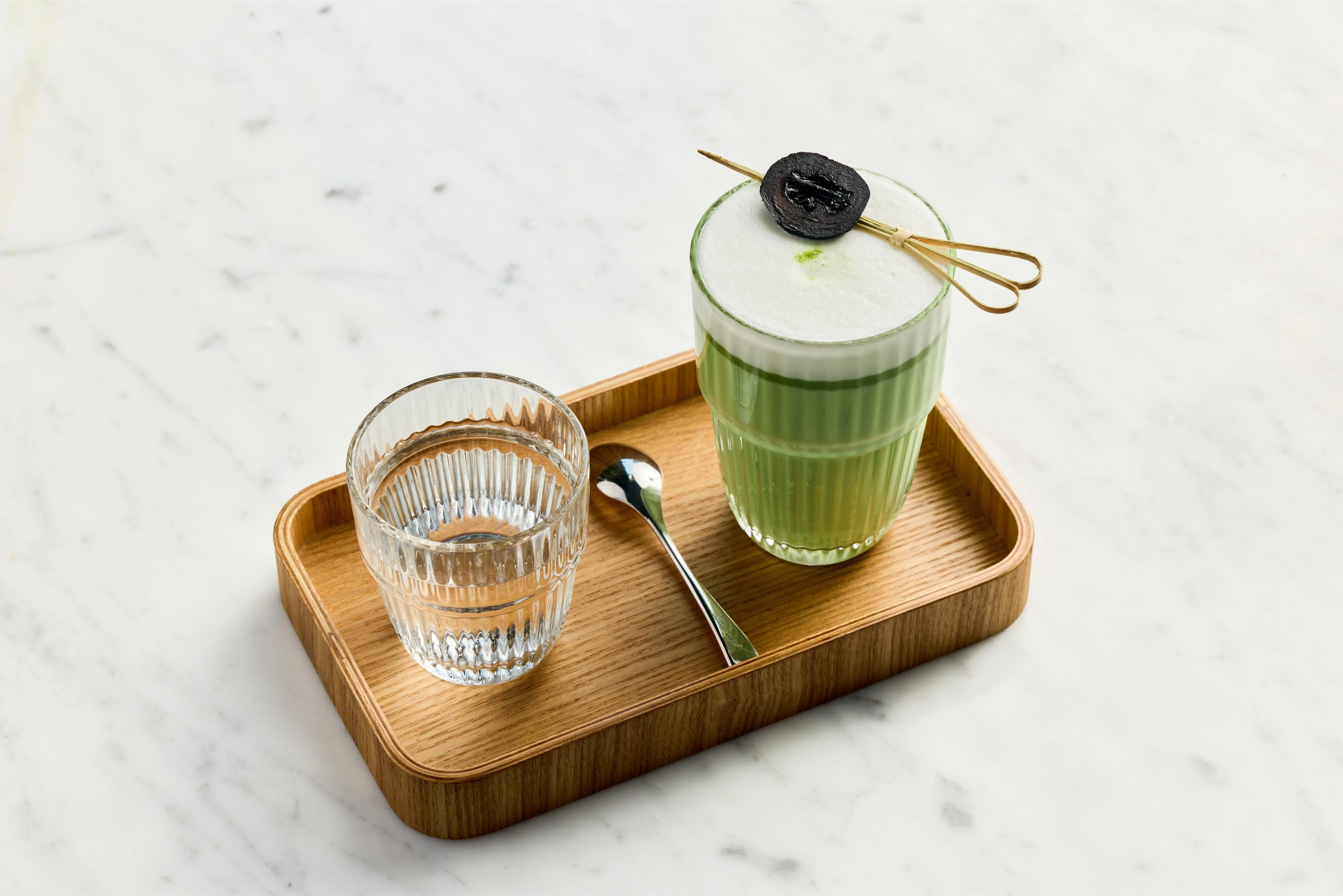 Menu from Let's Chama Bakery featuring coffee, tea, and lemonade options.
