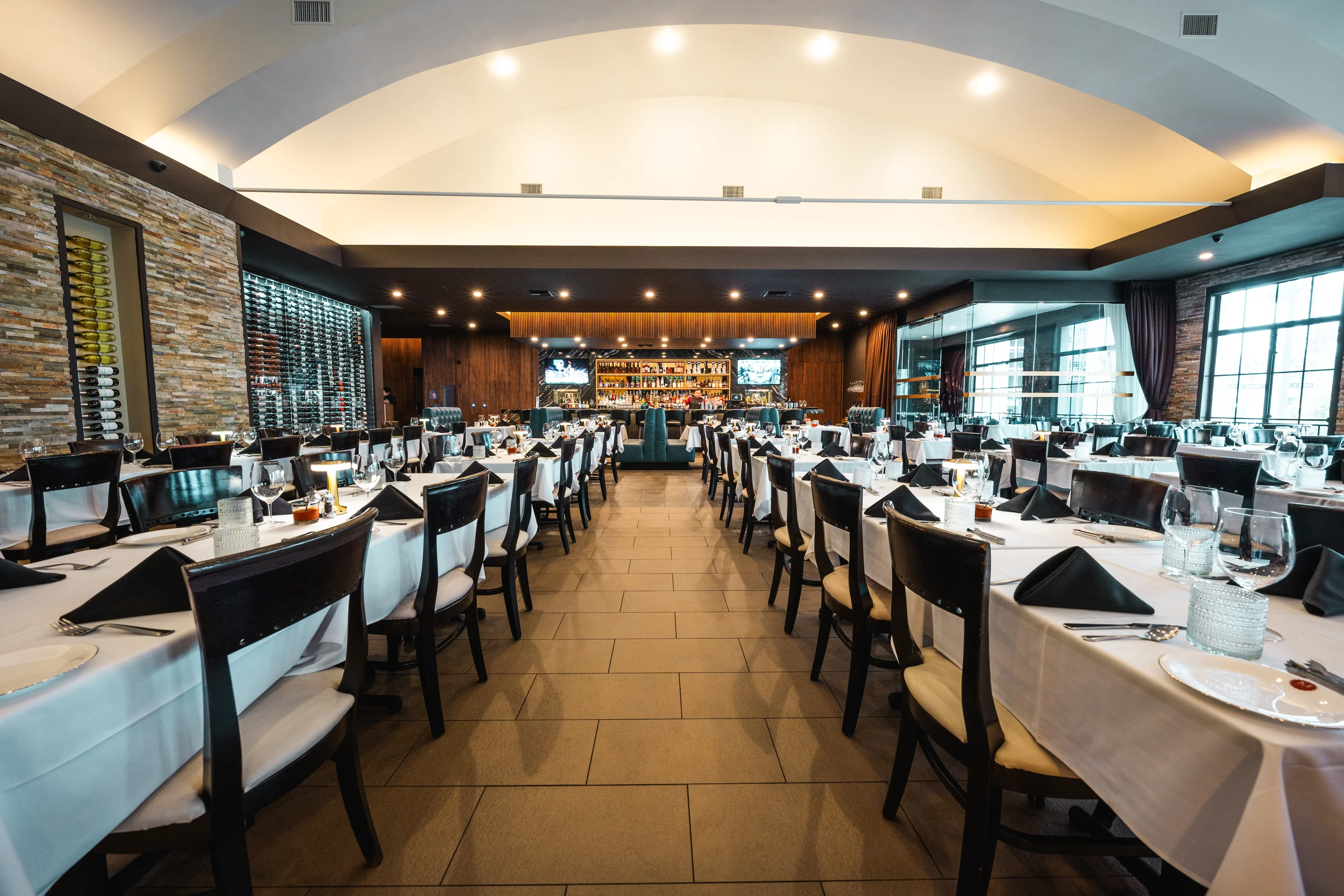 M Grill dining room set for a private event