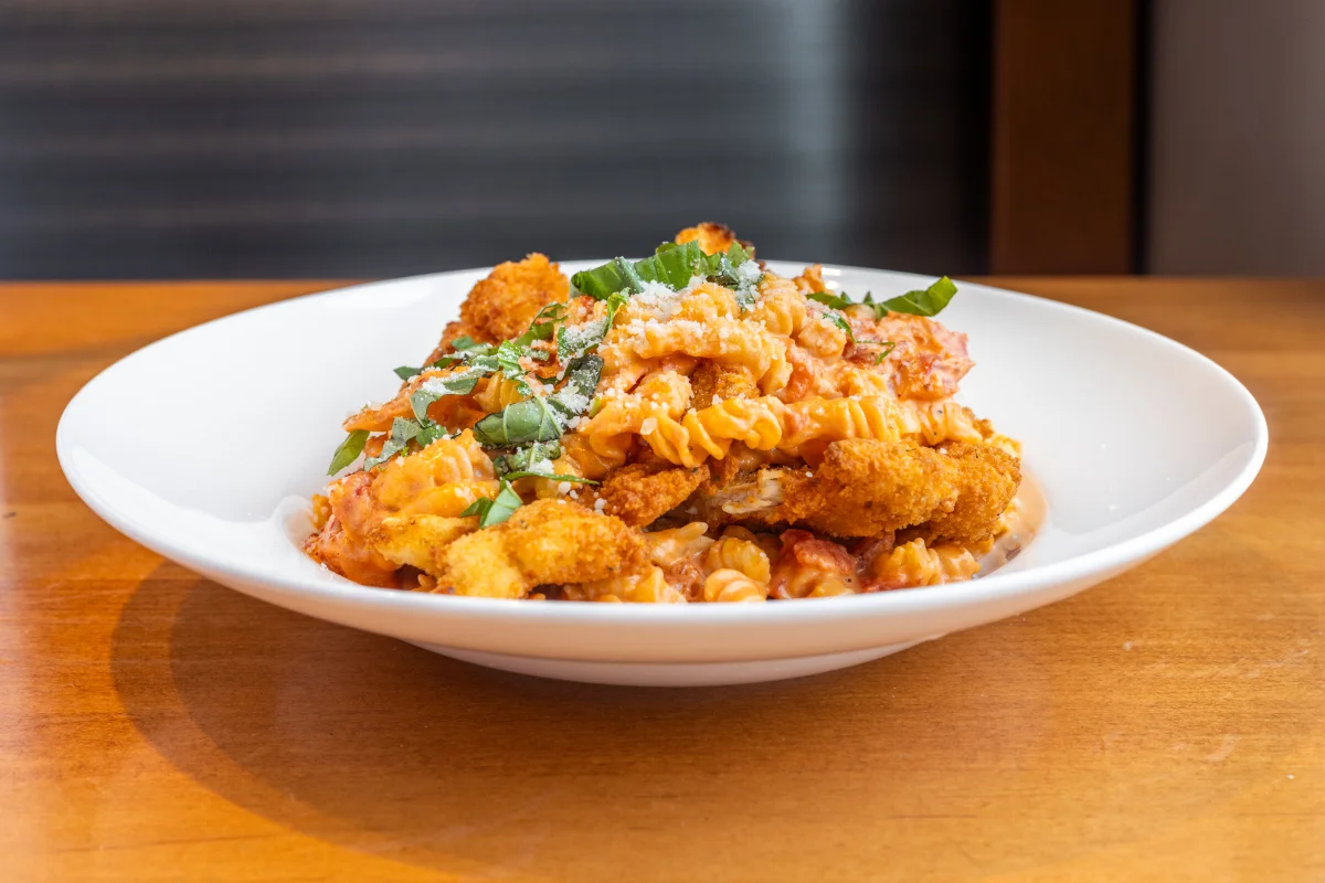 Baked pasta with marinara sauce and crispy toppings