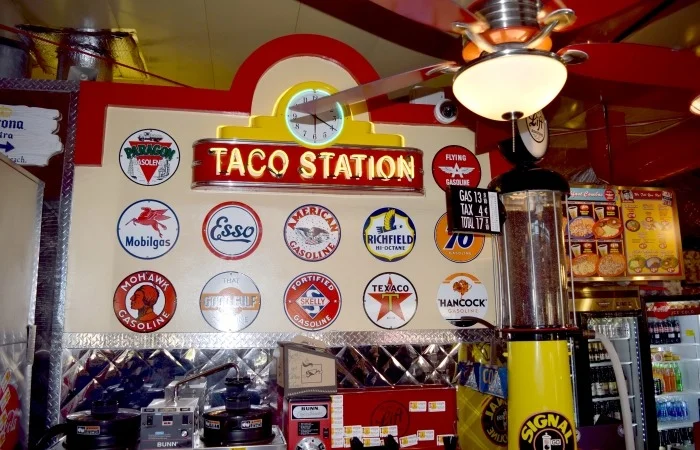 Colorful restaurant interior with vintage gas station decor