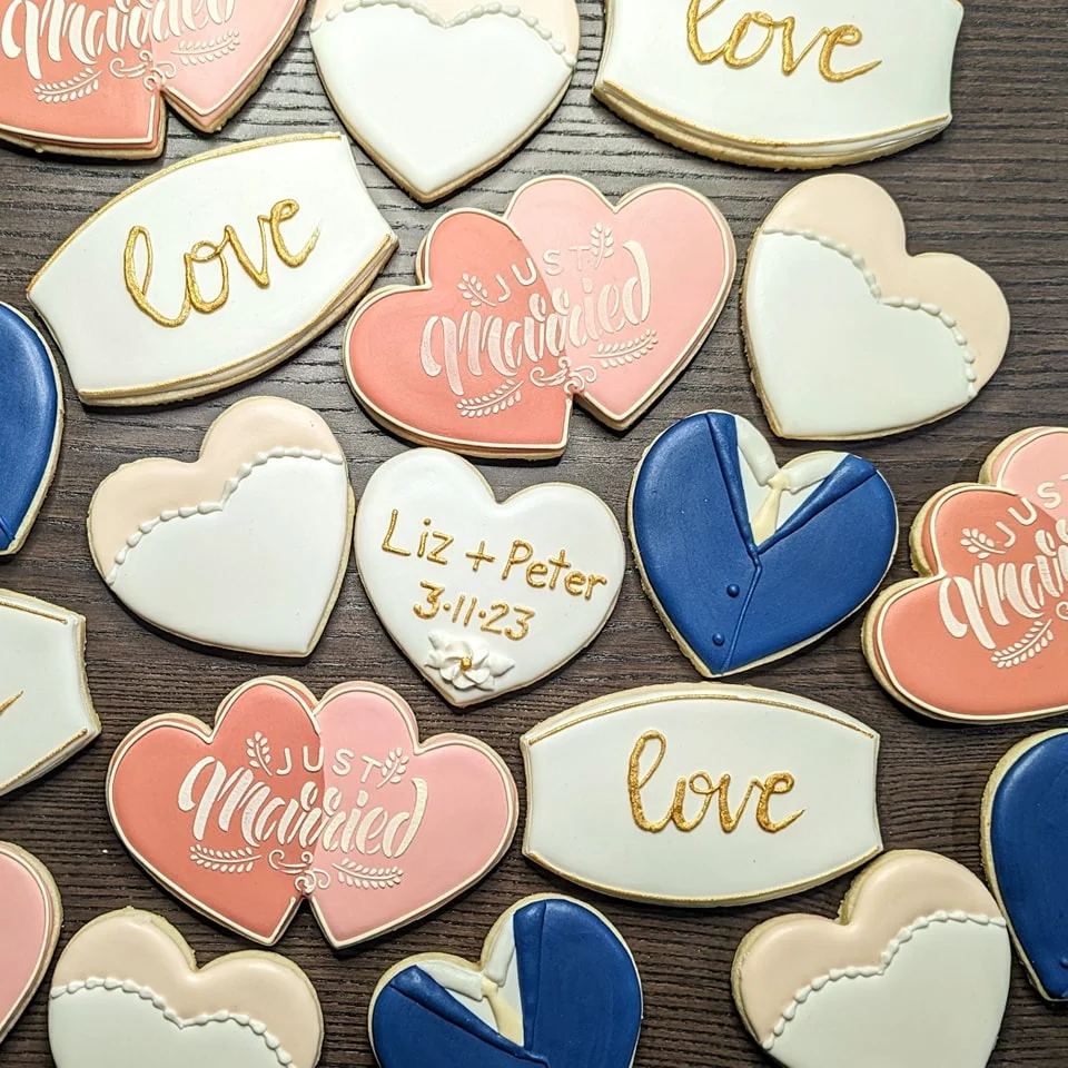 Decorative wedding cookies with hearts and love themes