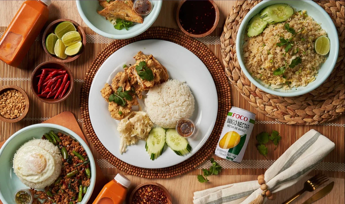 Thai fried chicken with rice and spicy condiments