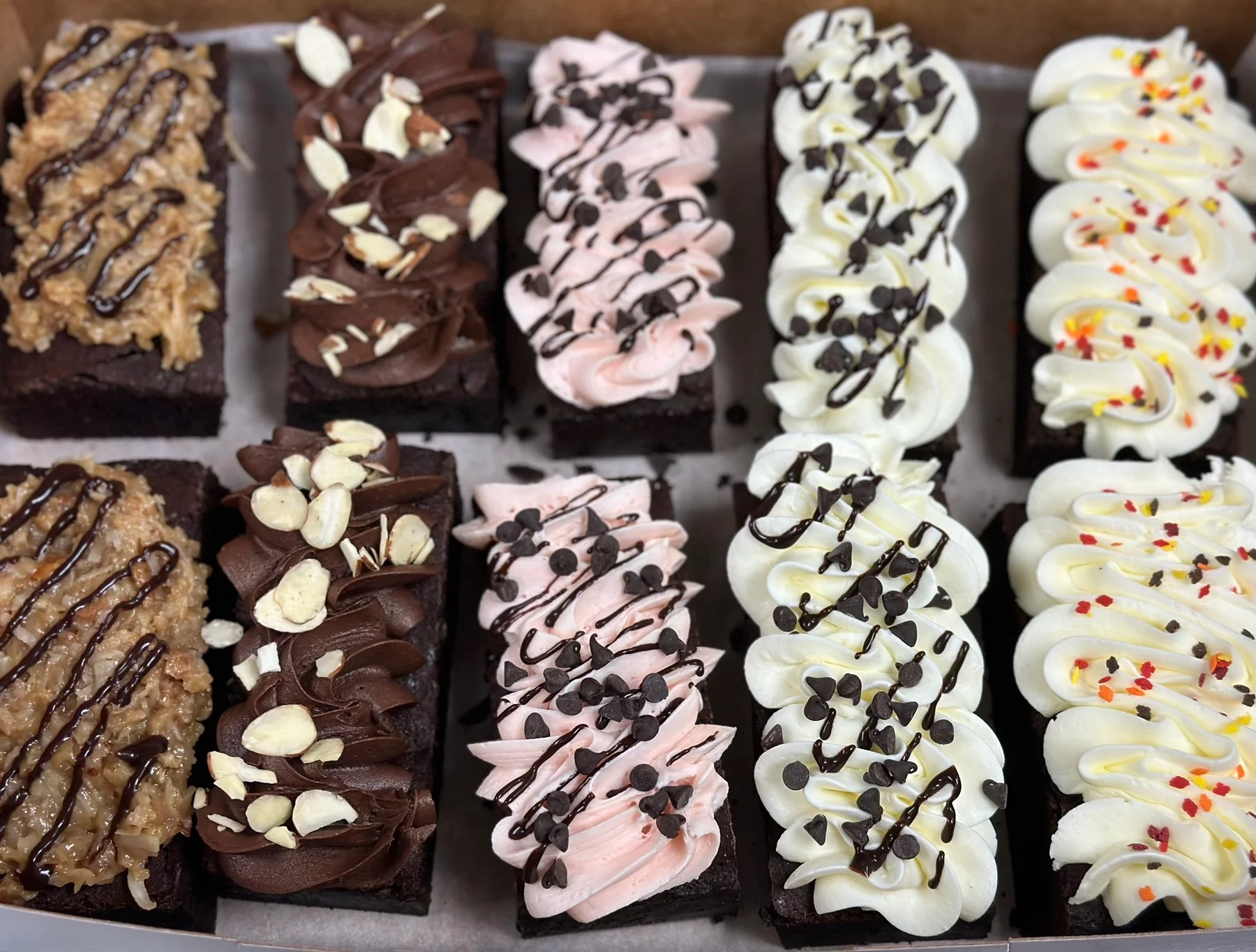 Decadent brownie bites with assorted toppings