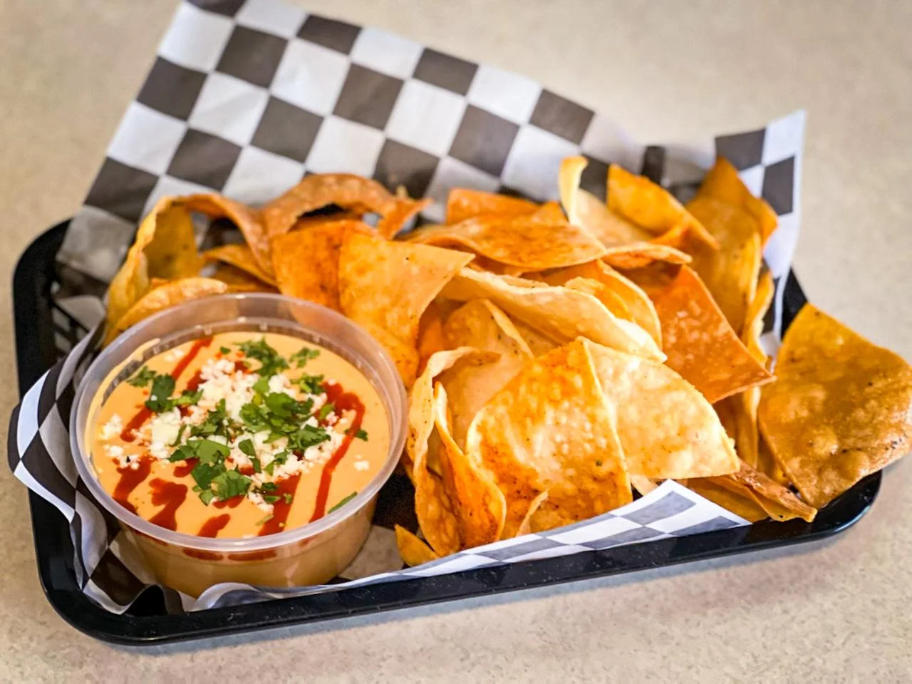 Chips and queso served at Stuffed Burritos in San Antonio