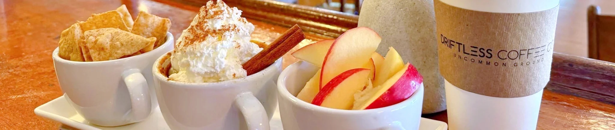 Cozy café interior with dessert trio and coffee