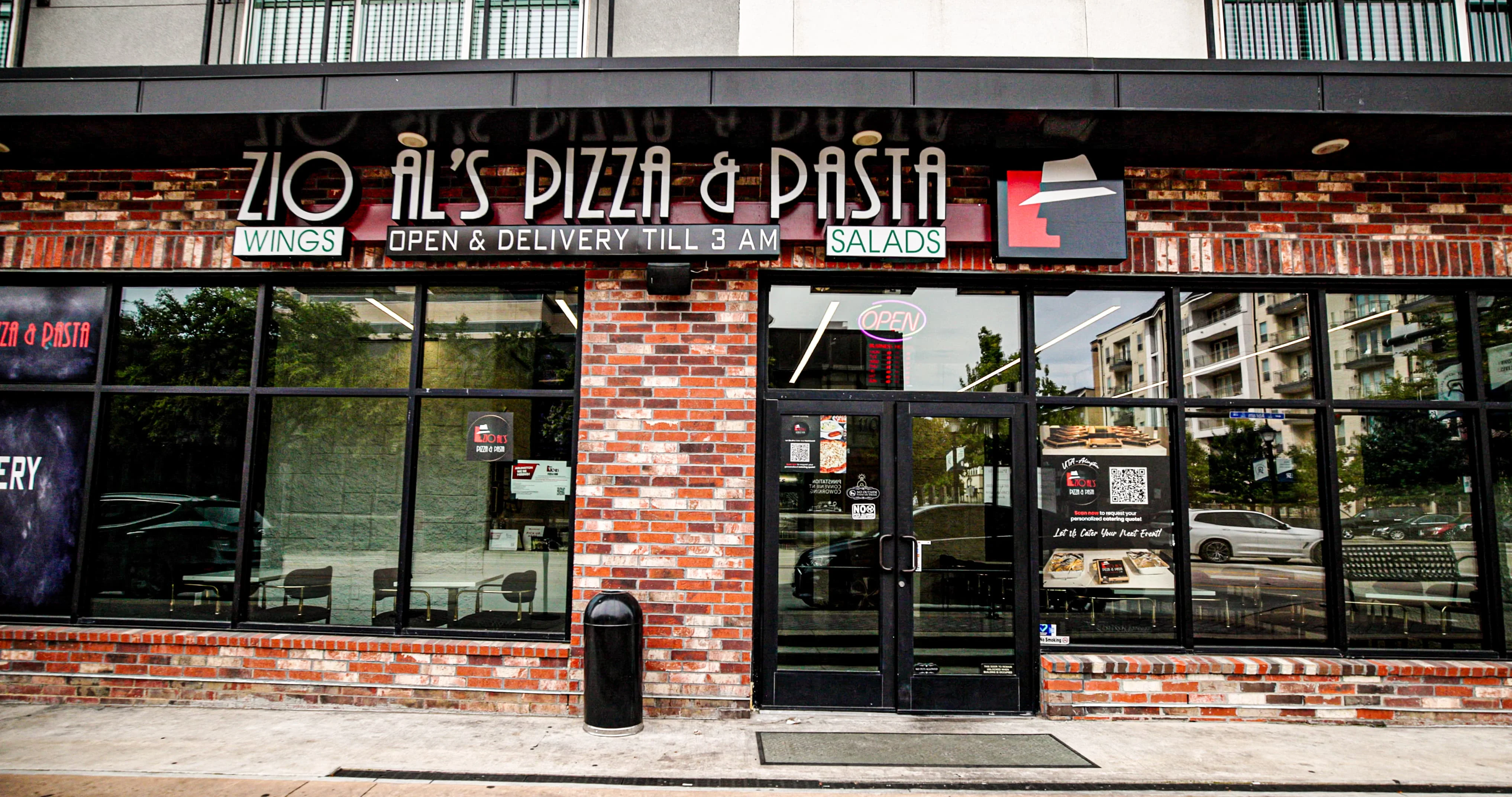Exterior of Zio Al's Pizza & Pasta restaurant with open sign