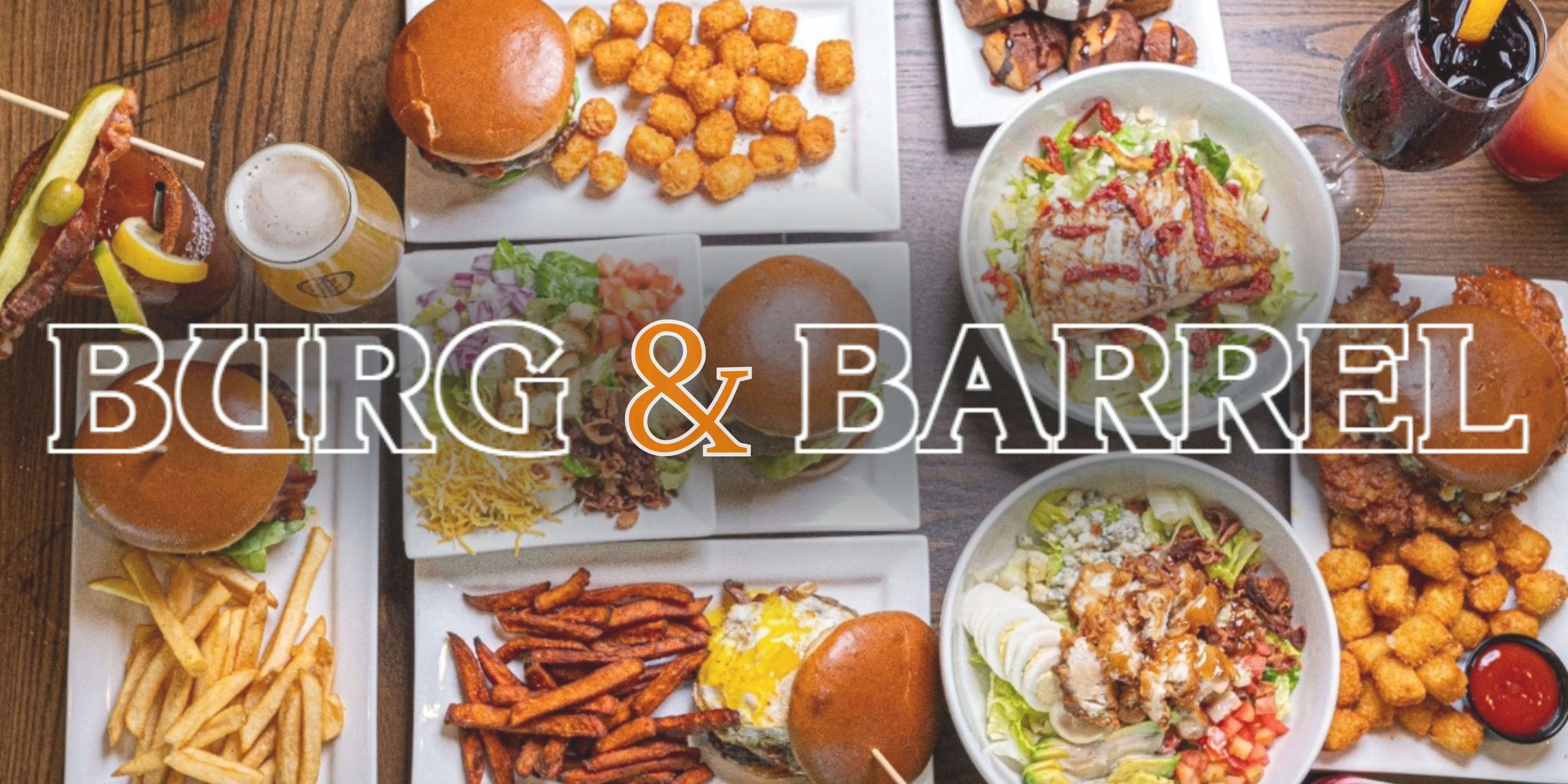 Assorted gourmet burgers and sides in a vibrant restaurant setting