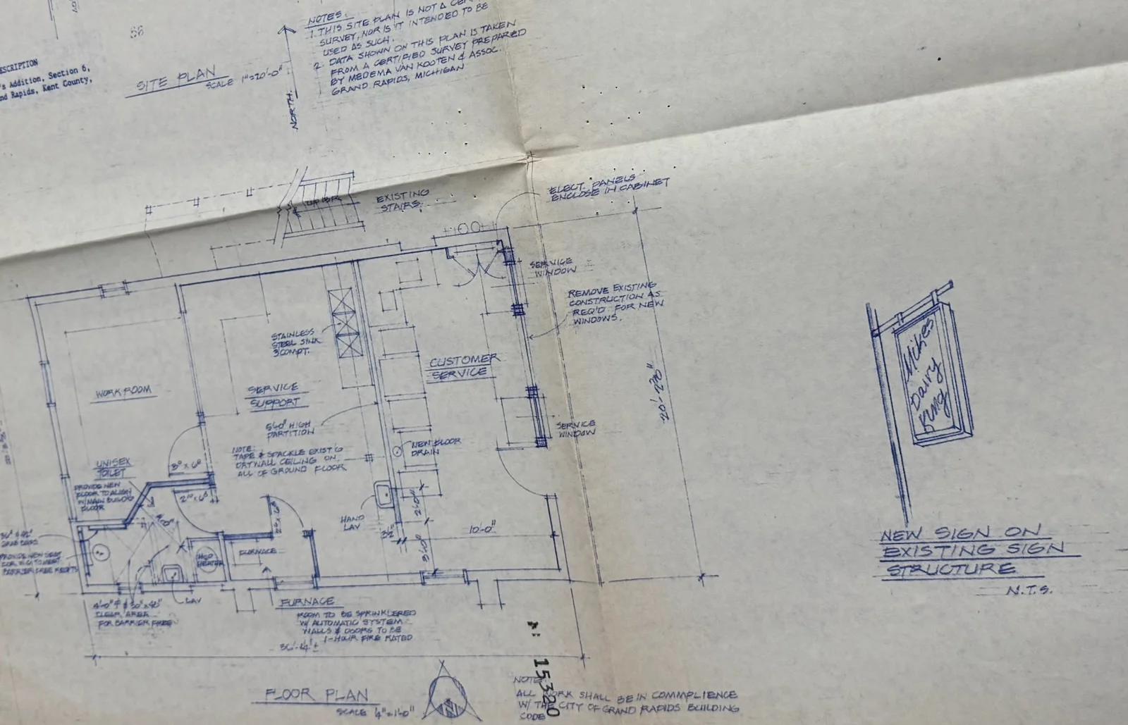Architectural blueprint for restaurant layout and signage