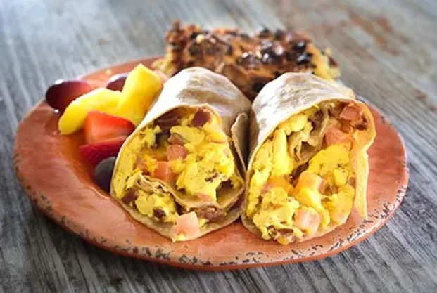 Breakfast burrito with scrambled eggs and ham