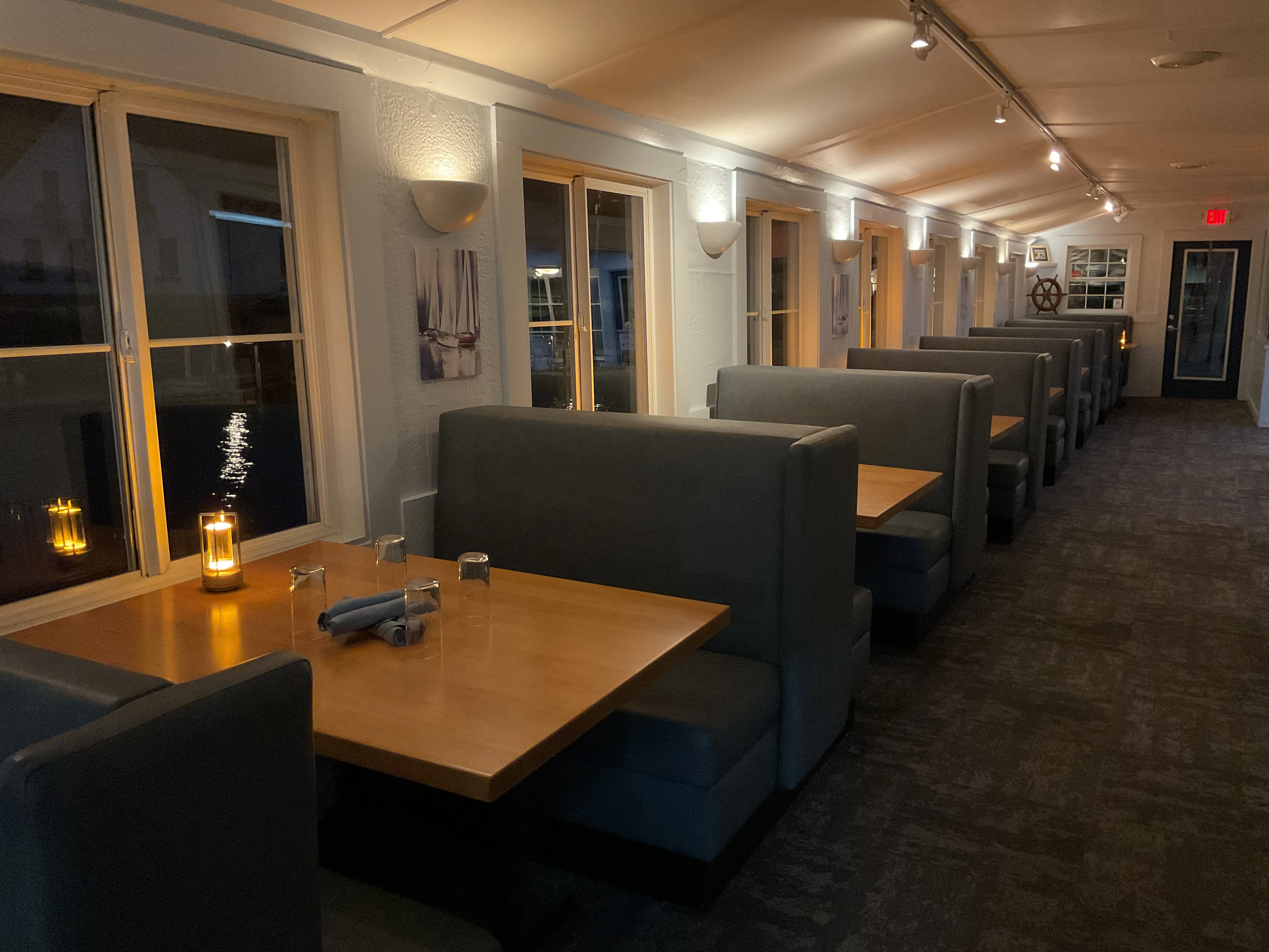 Cozy restaurant interior with booths and warm lighting