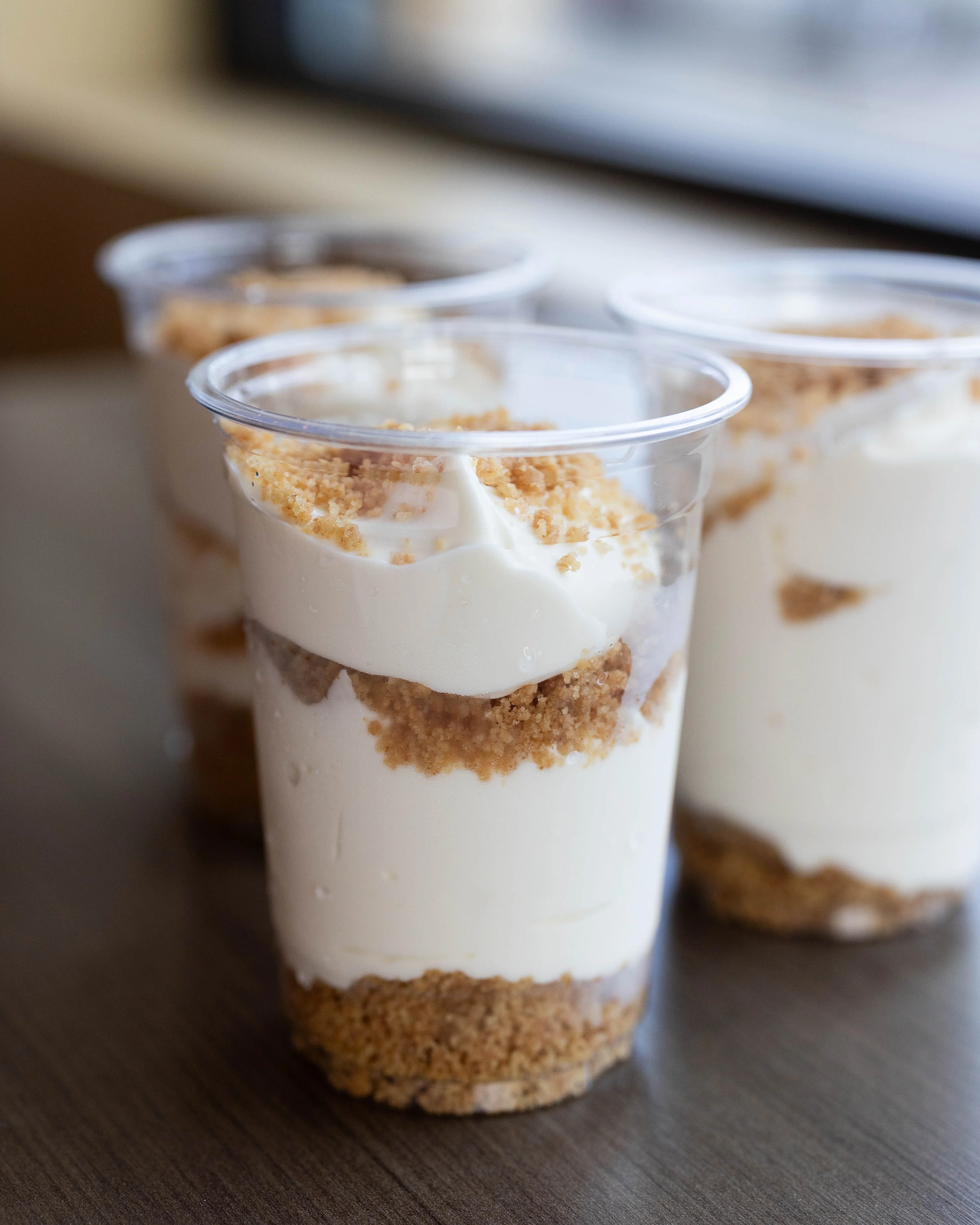 Creamy cheesecake parfait in clear cups