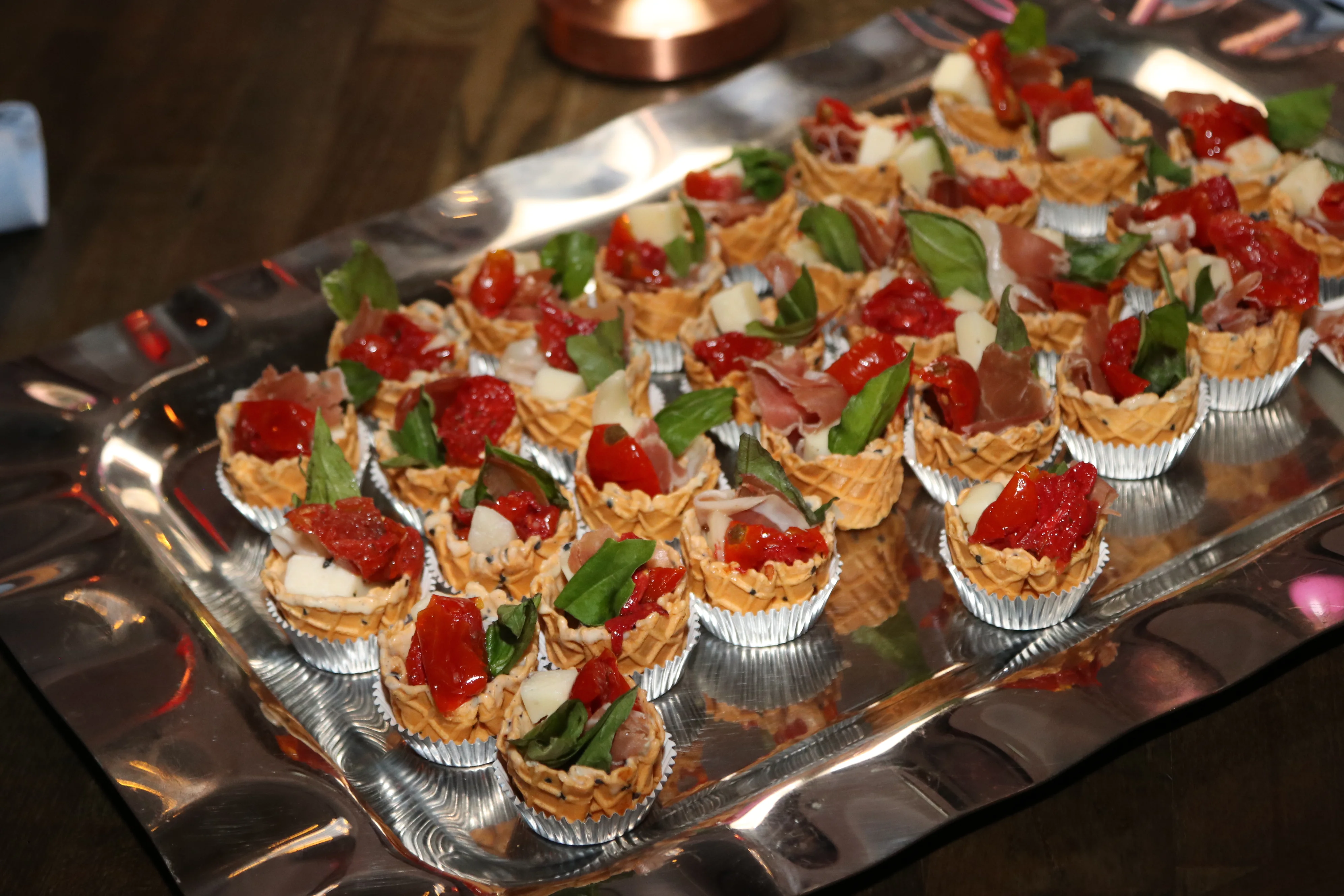 Mozzarella, tomato, and basil appetizer bites in Mount Kisco served in individual cups