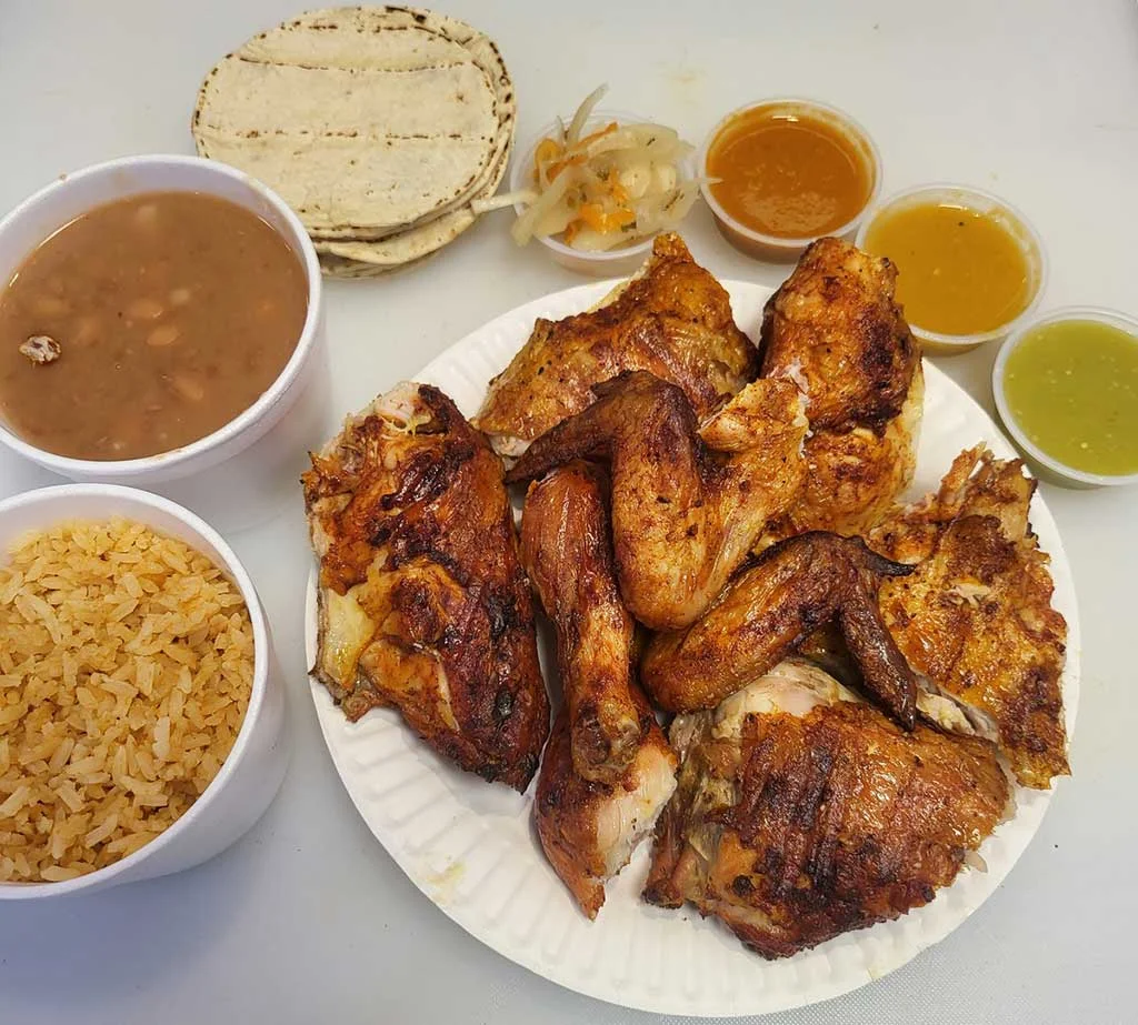Authentic Mexican pollo asado with rice and beans