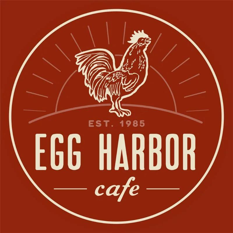 Logo of Egg Harbor Cafe featuring a rooster design