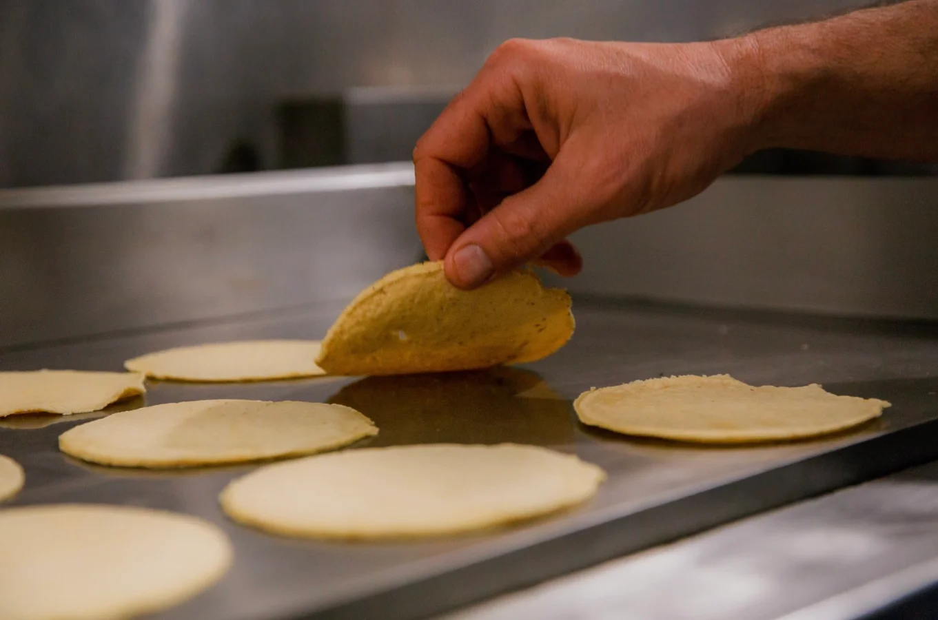 A restaurant chef preparing a dish