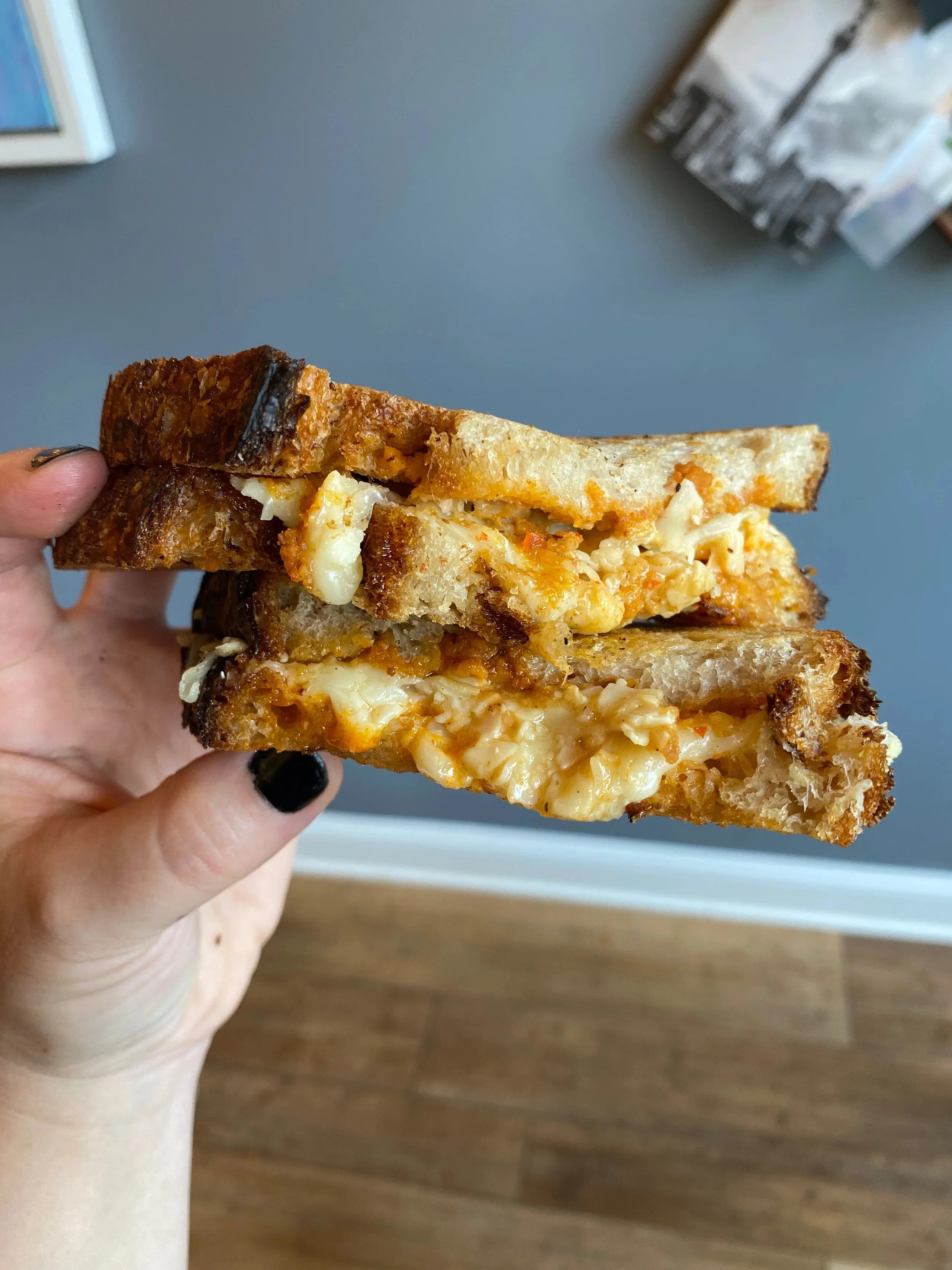 Grilled cheese sandwich with melted cheese layers