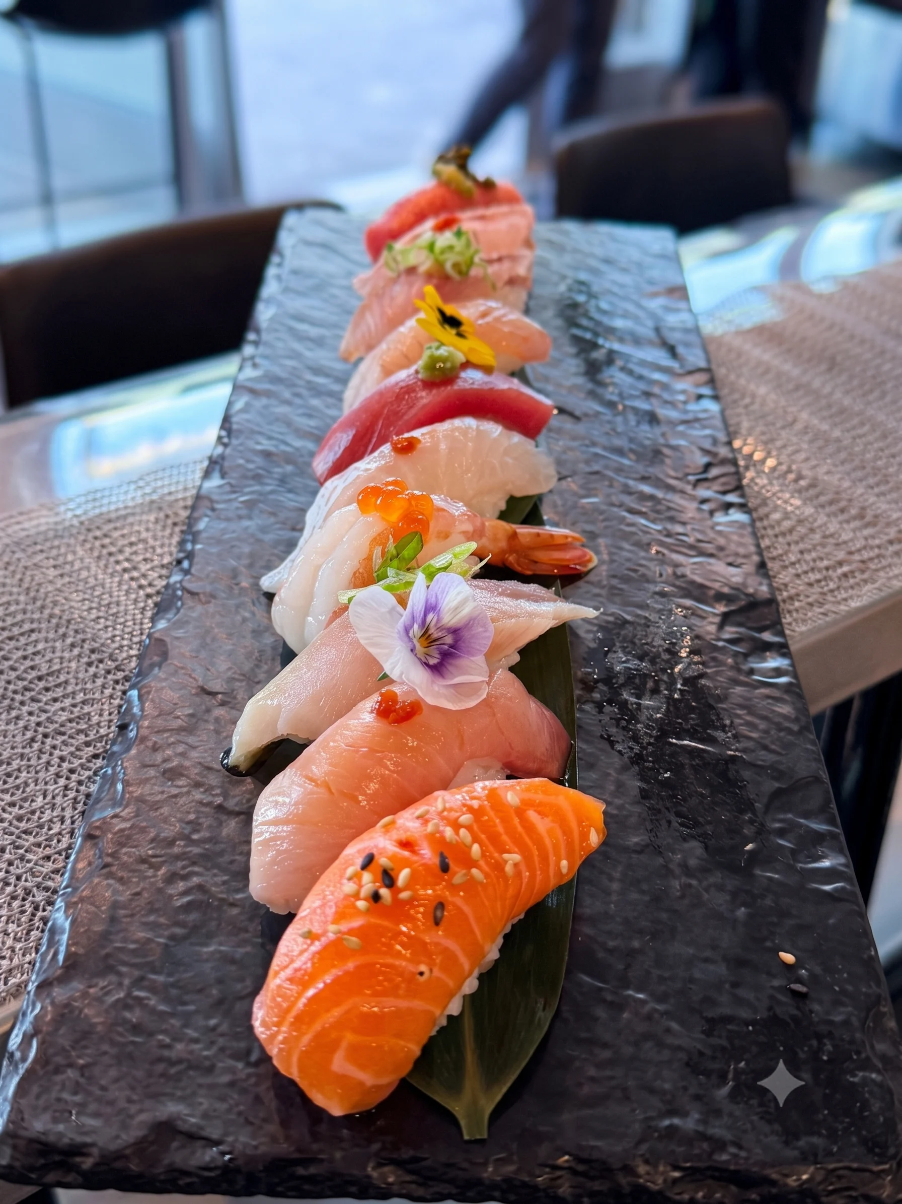 Assorted sushi platter featuring nigiri and sashimi