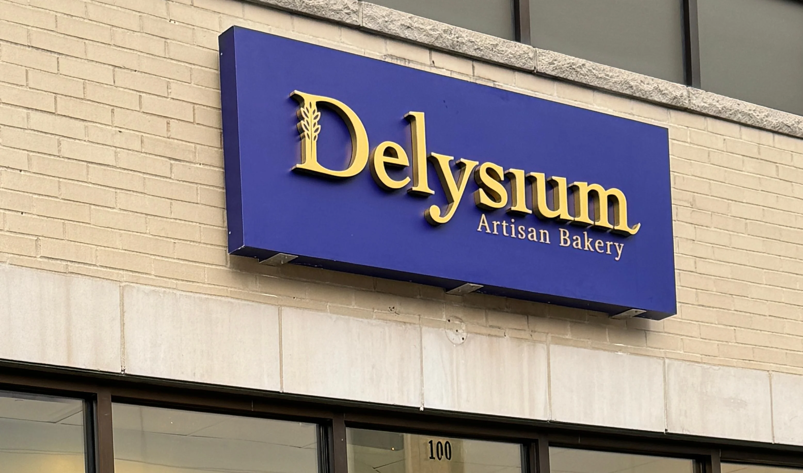 Exterior of Delysium Artisan Bakery with open sign
