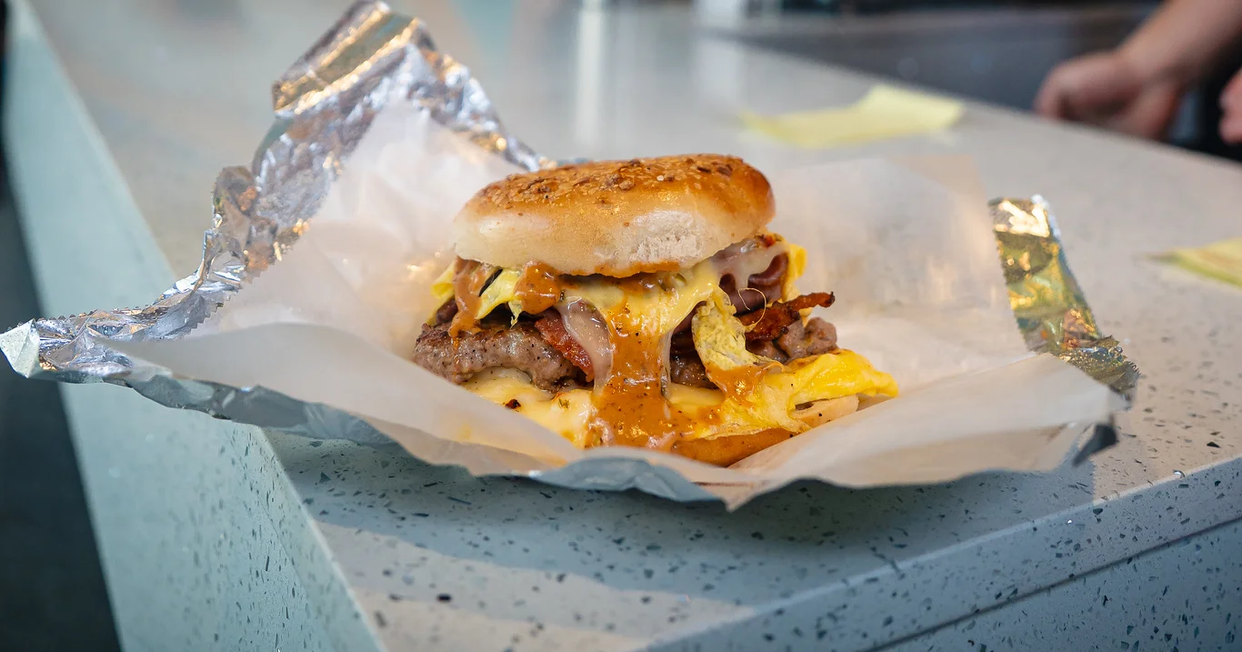 Savory breakfast bagel sandwich with melted cheese