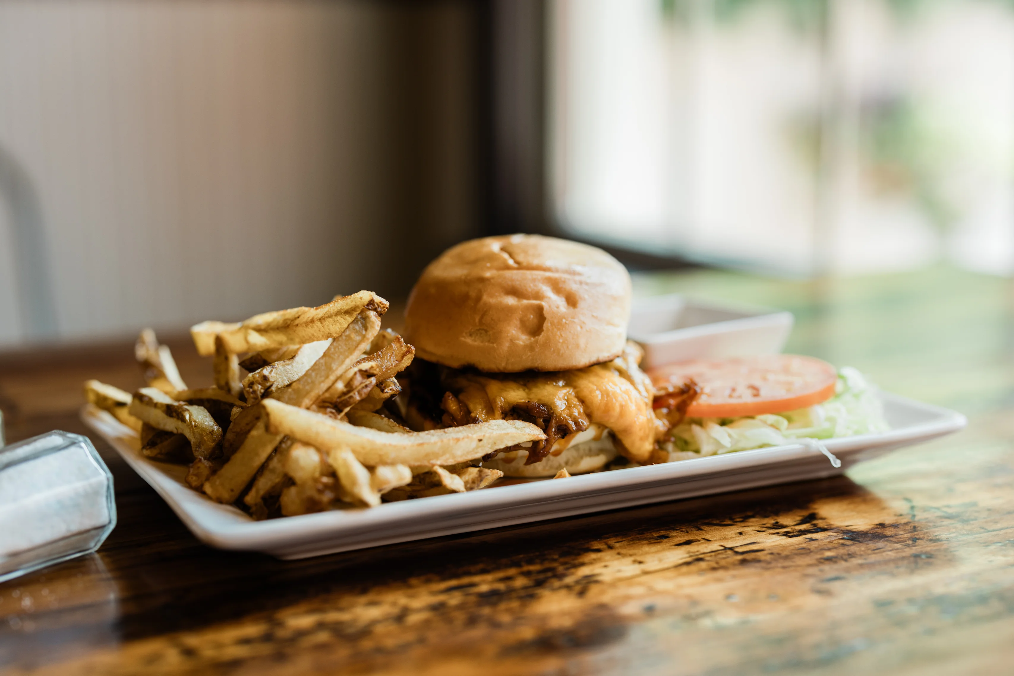 Classic American cheeseburger with fries