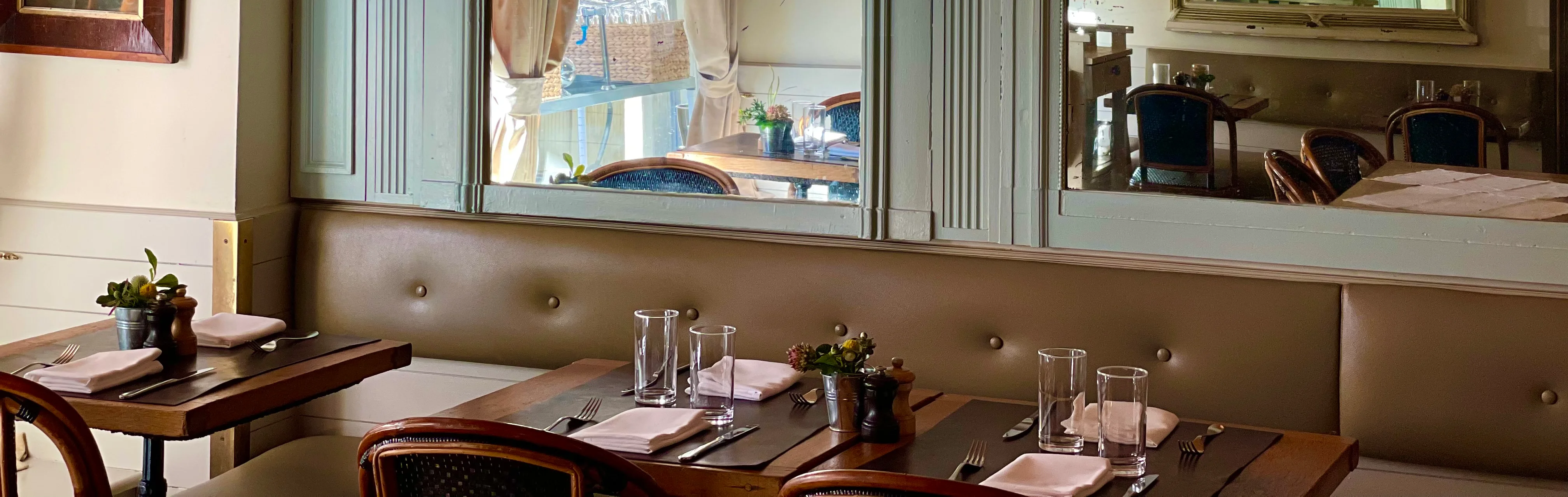 Charming restaurant interior with elegant decor and cozy seating
