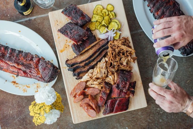 Texas-style barbecue platter with ribs and sausage