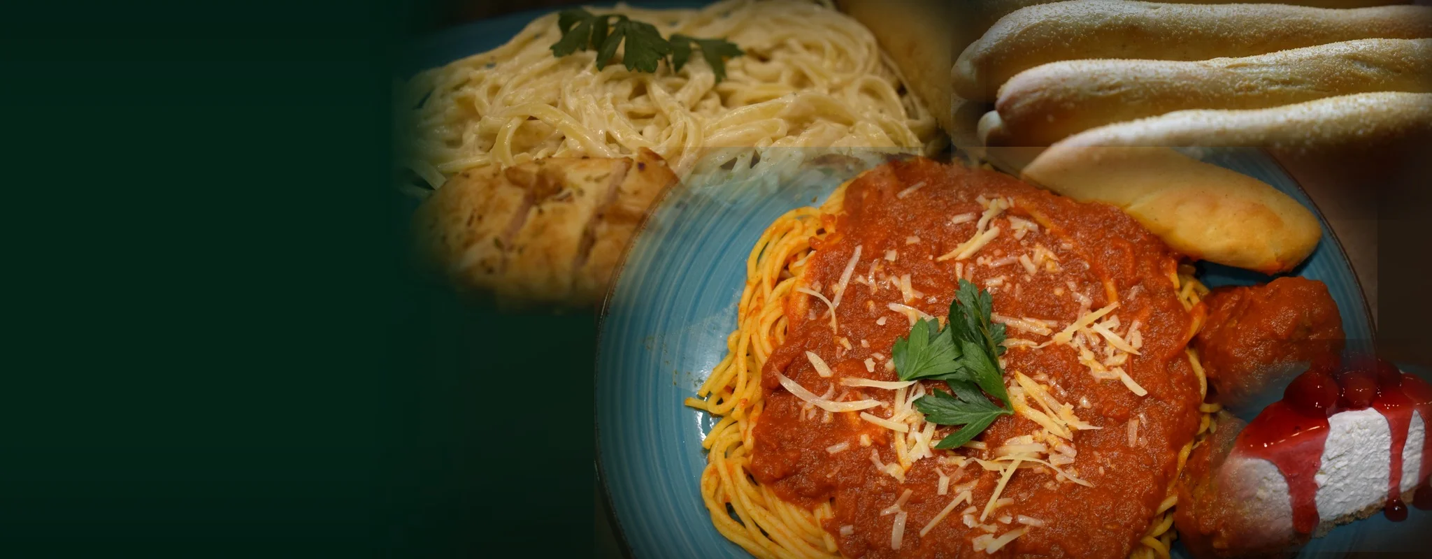 Plate of spaghetti with marinara sauce and garlic bread