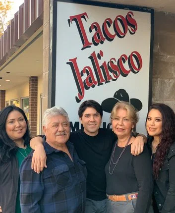 Family portrait outside Tacos Jalisco restaurant
