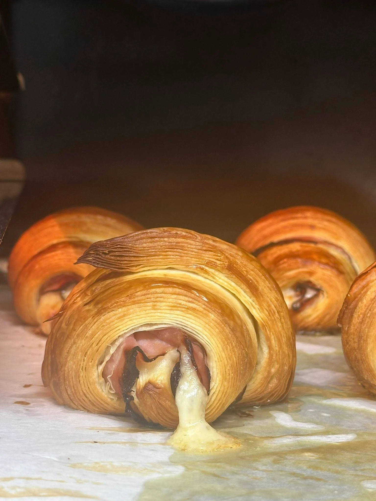 Cheesy ham croissant fresh from the oven