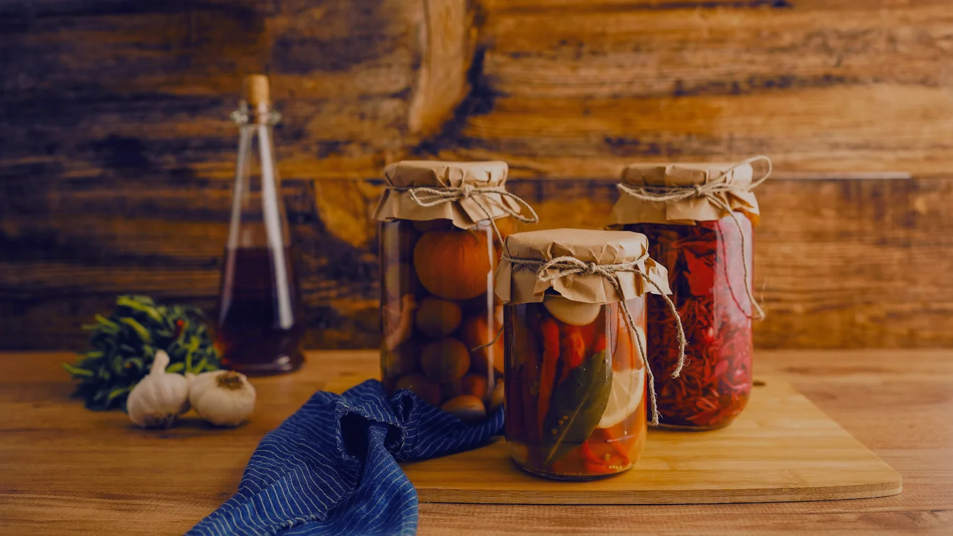 Assorted pickled vegetables in jars