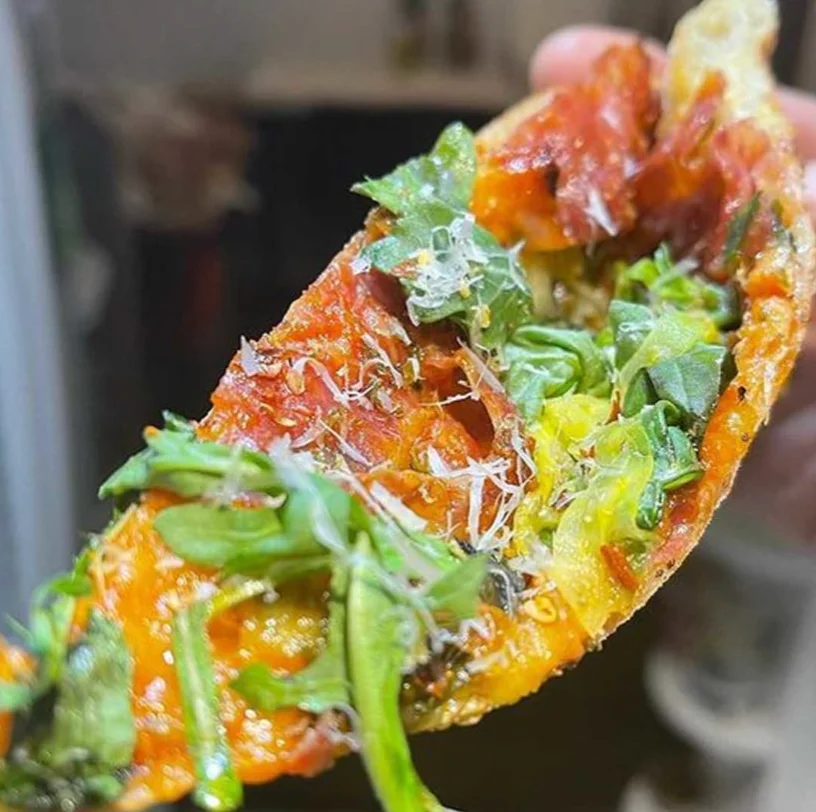 A restaurant chef preparing a dish