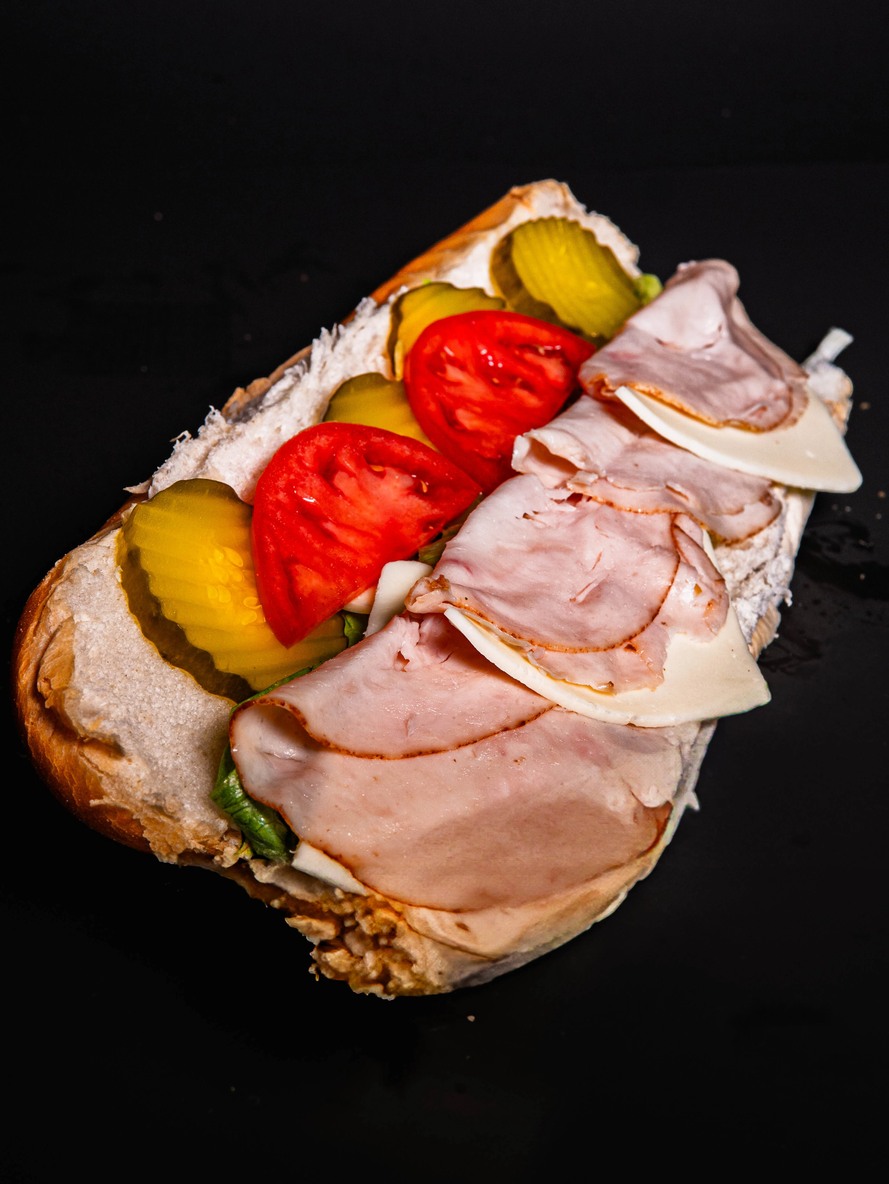 Classic Italian sub sandwich with meats and fresh vegetables