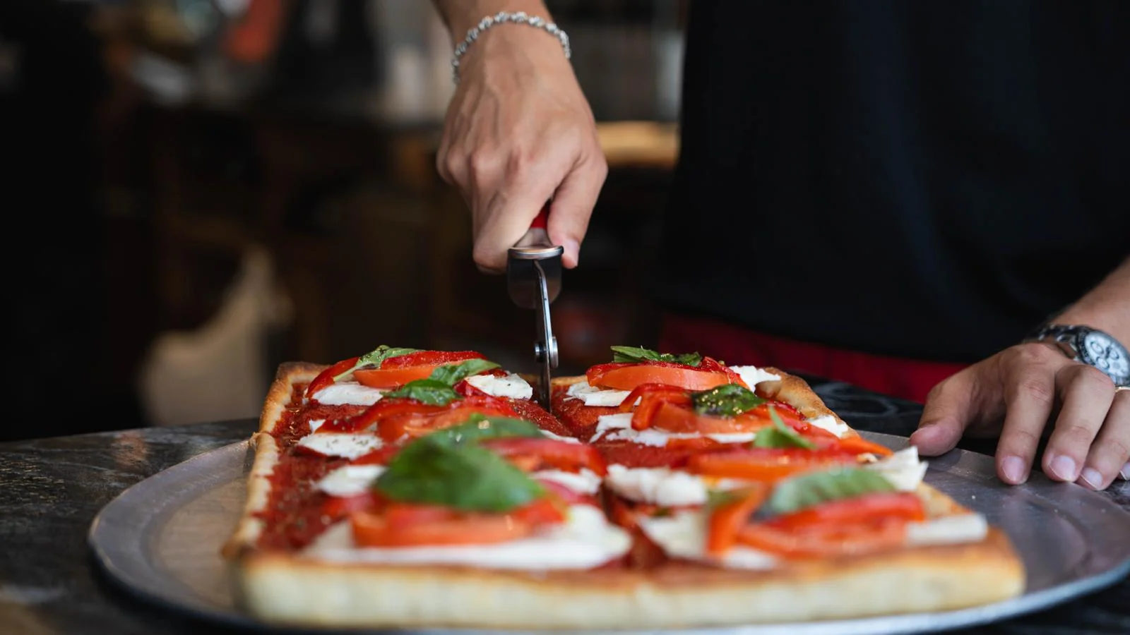 A restaurant chef preparing a dish