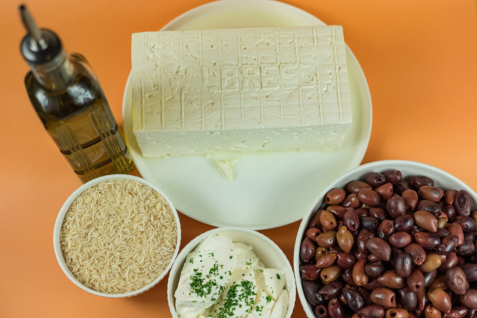 Santorini's fresh Mediterranean ingredients including olive oil hummus lemon rice and Kalamata olives