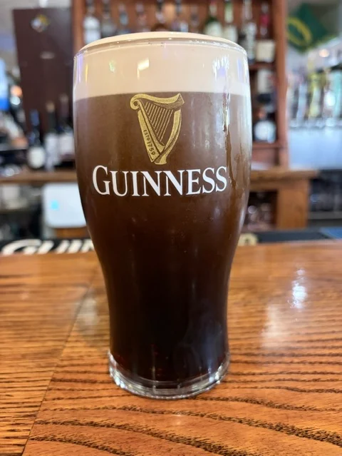 Pint of Guinness stout served in a pub