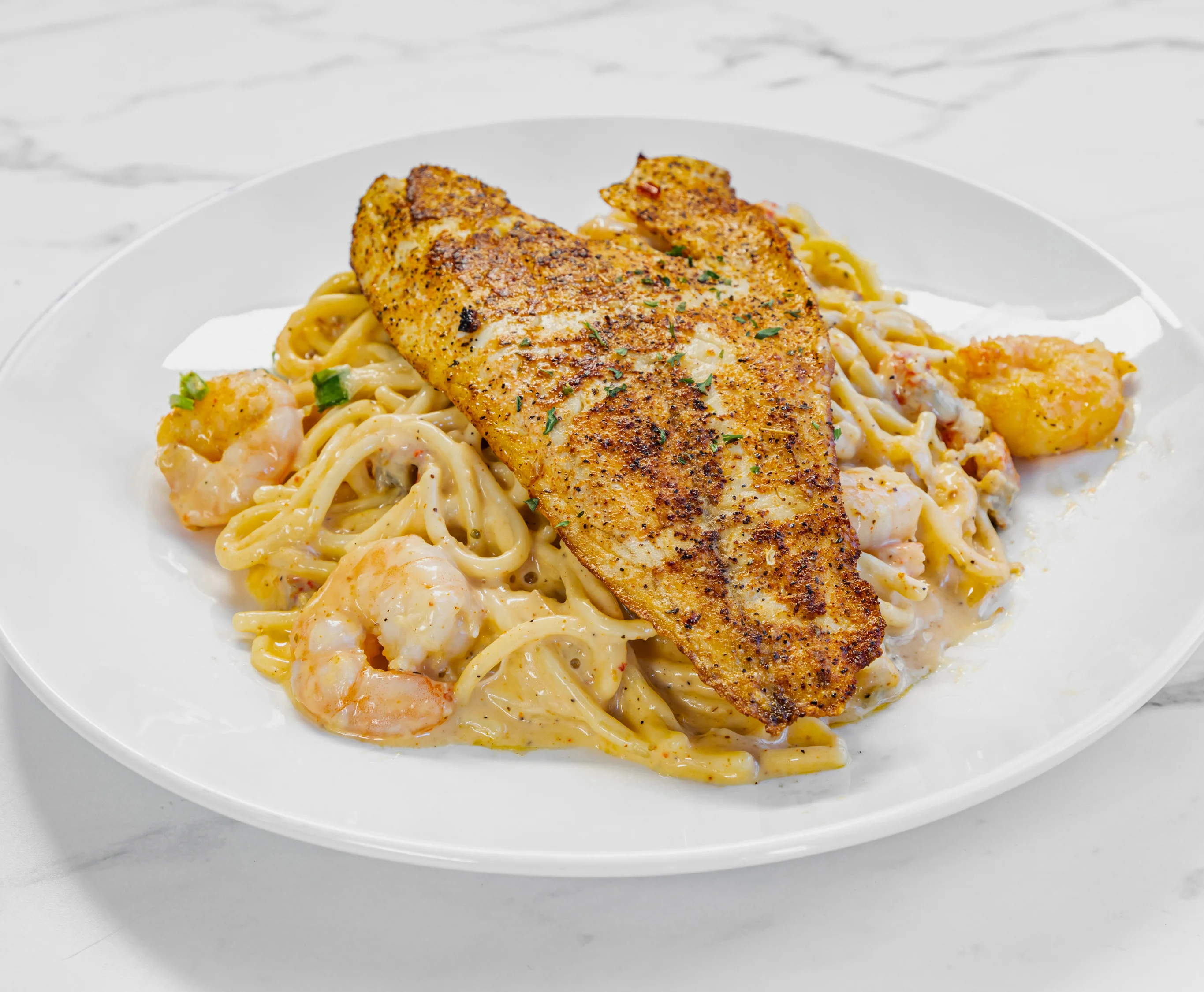 Cajun blackened fish pasta with shrimp