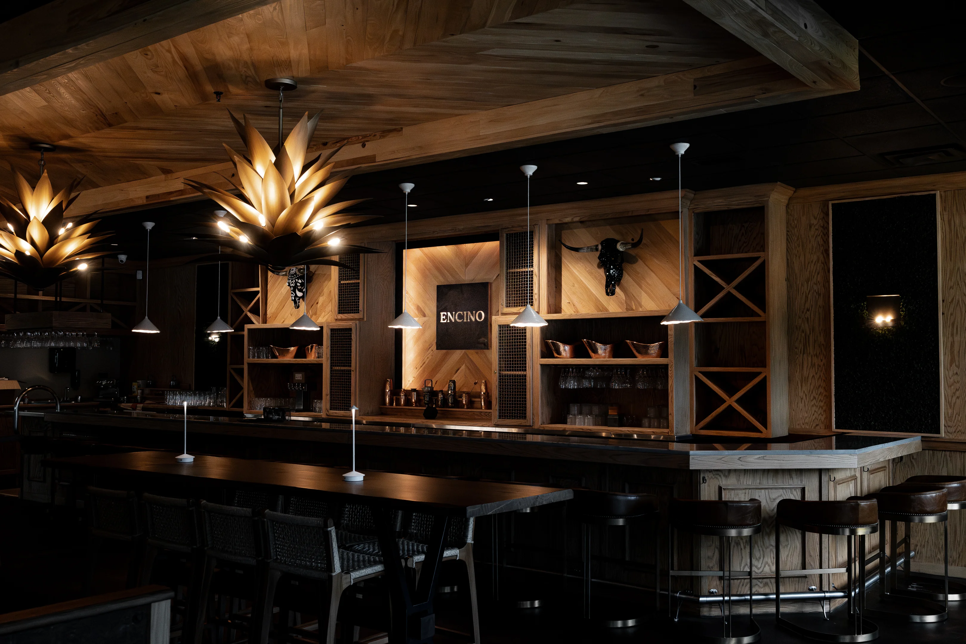 Stylish bar interior with wooden accents and unique lighting