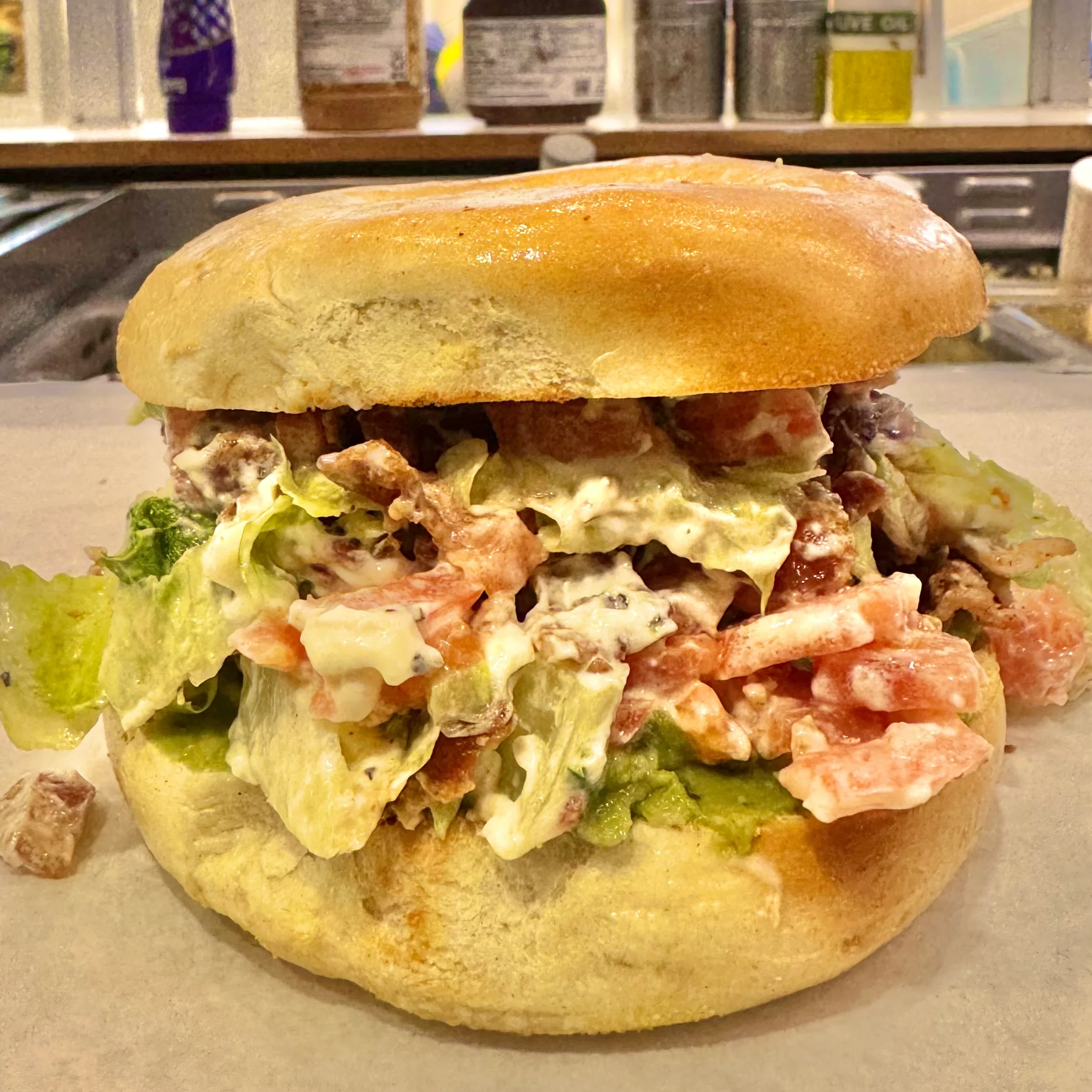 Hearty sandwich with fresh vegetables and creamy dressing