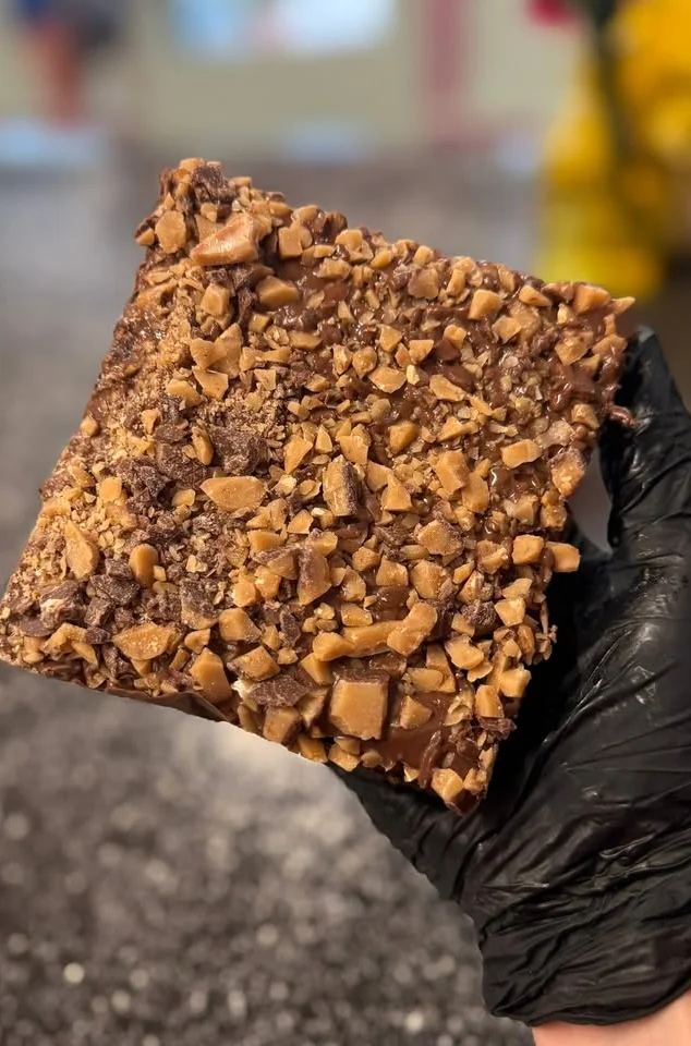 Decadent chocolate toffee bar with crunchy toppings