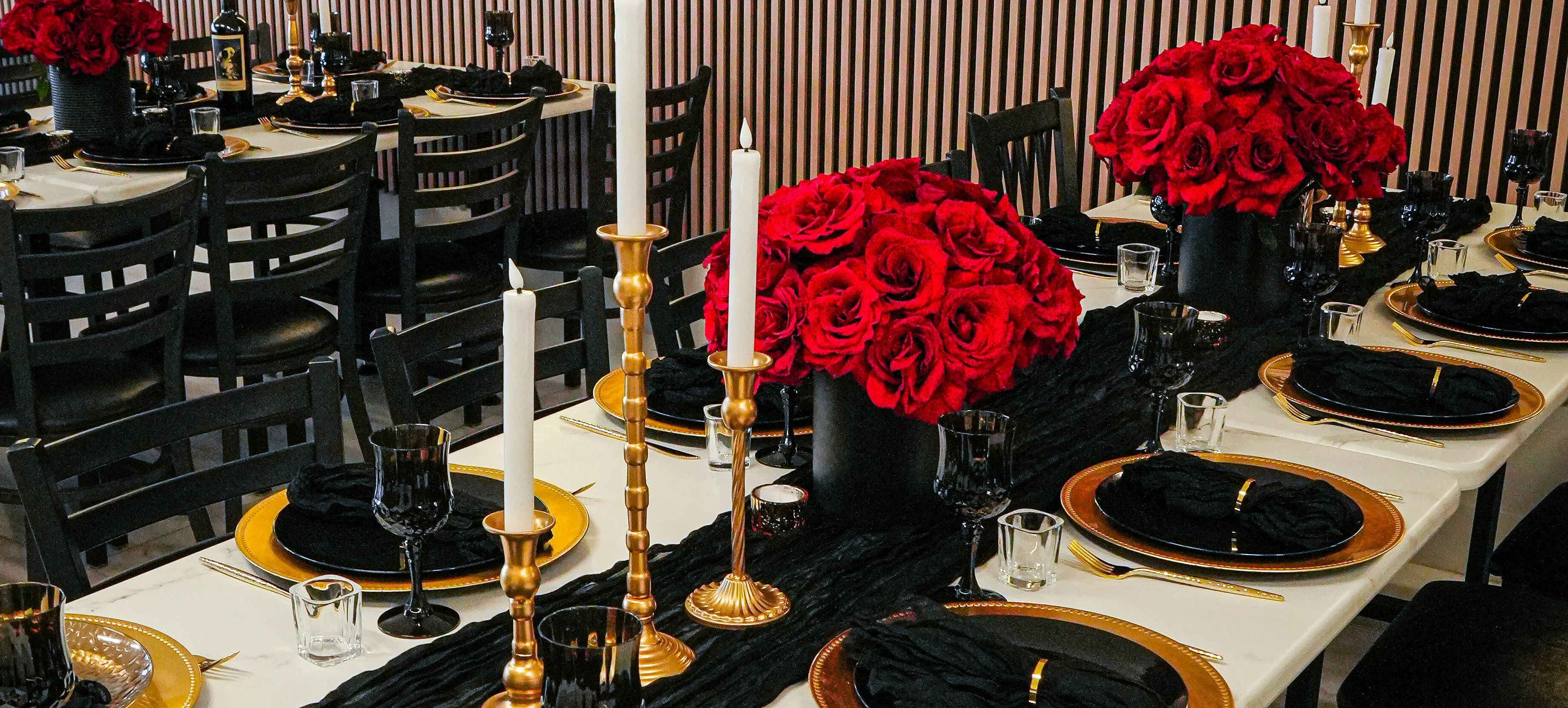 Elegant restaurant setting with red roses and candlelight