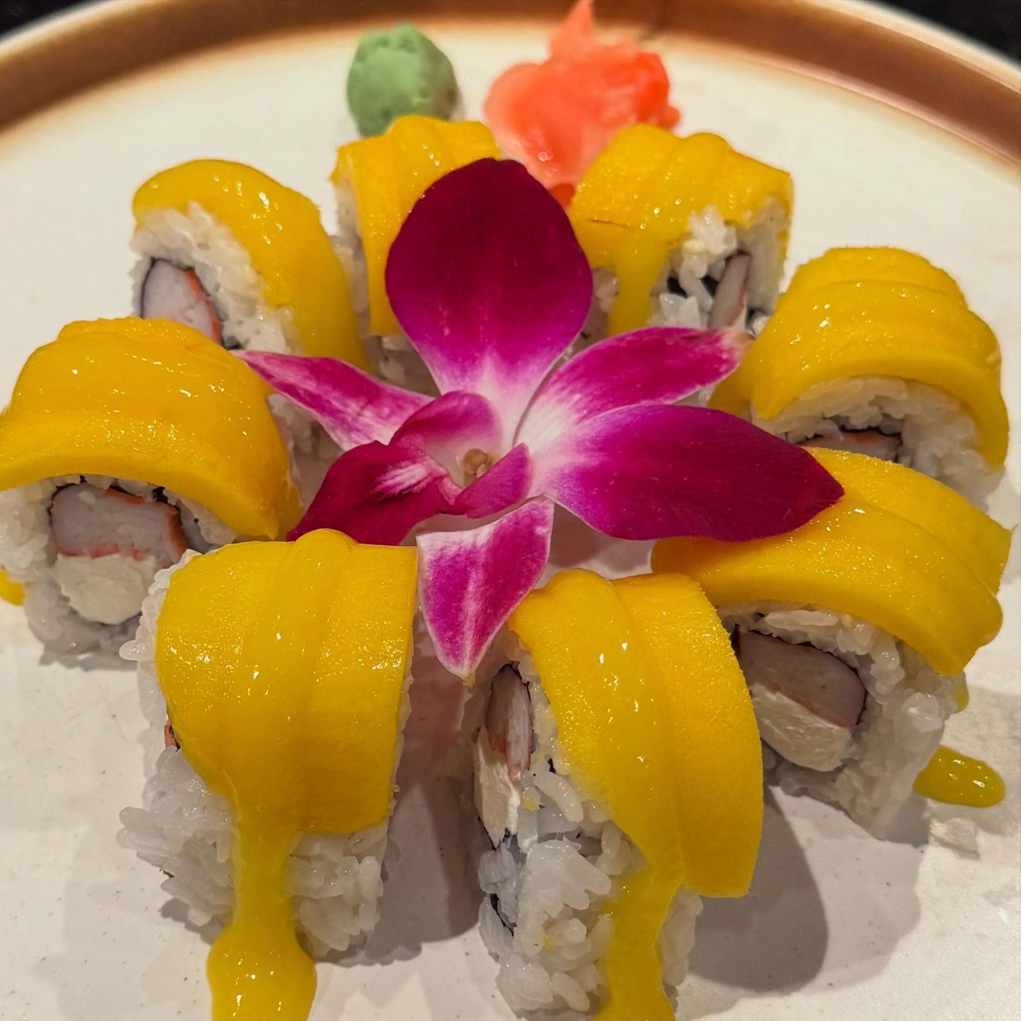 Assorted sushi platter showcasing vibrant rolls