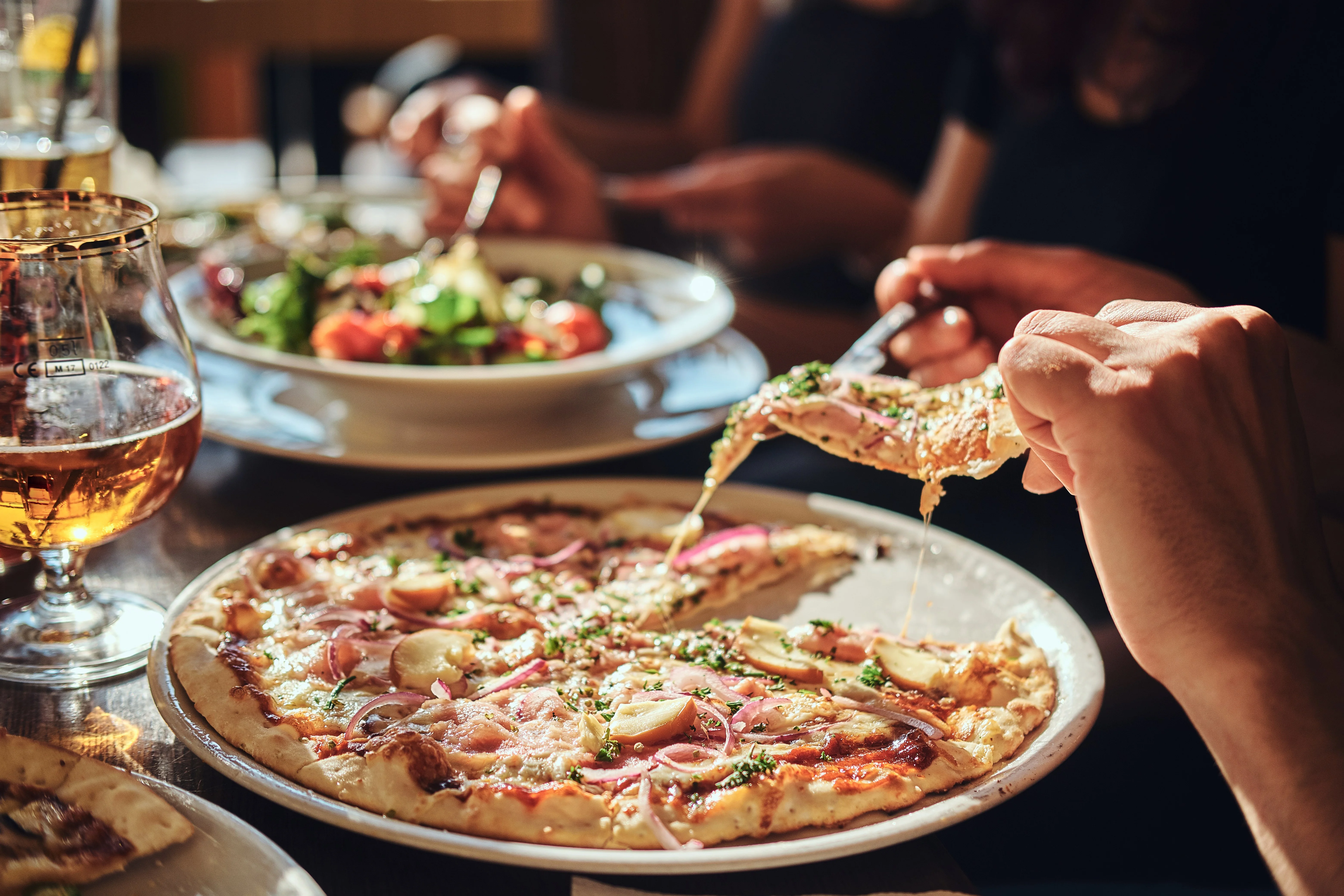 Delicious Margherita pizza served in a cozy restaurant setting