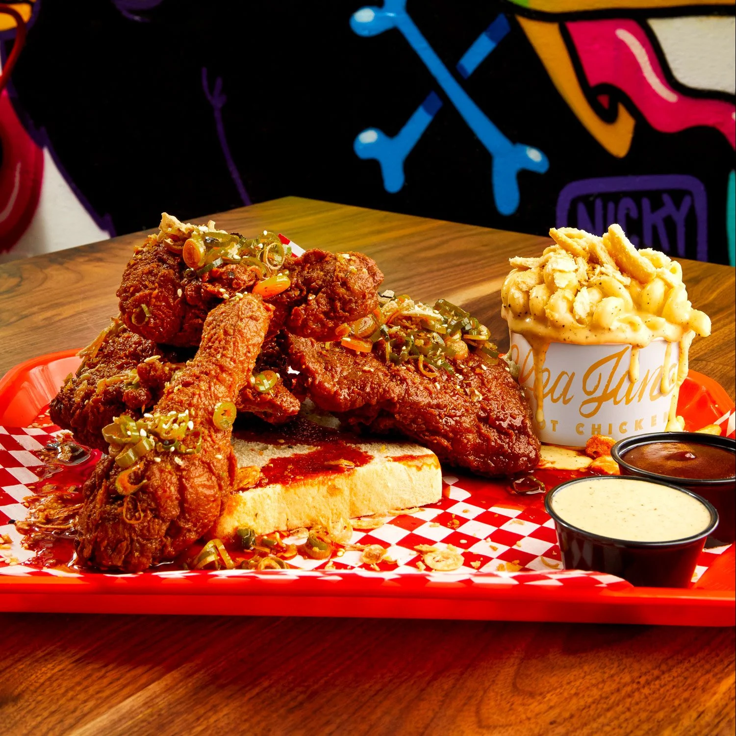 Southern fried chicken with sides in a vibrant restaurant setting