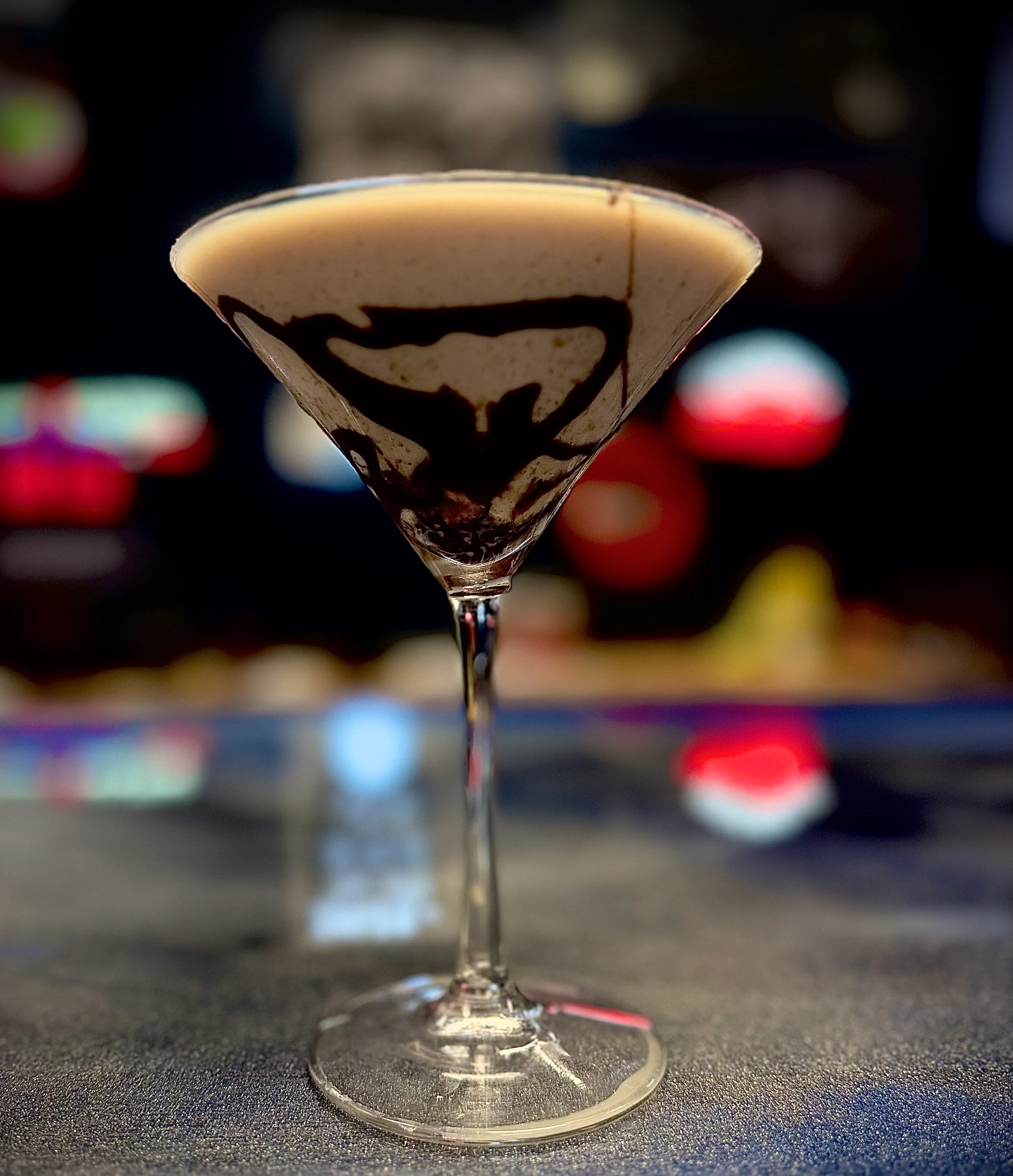 Chocolate martini with artistic swirl design