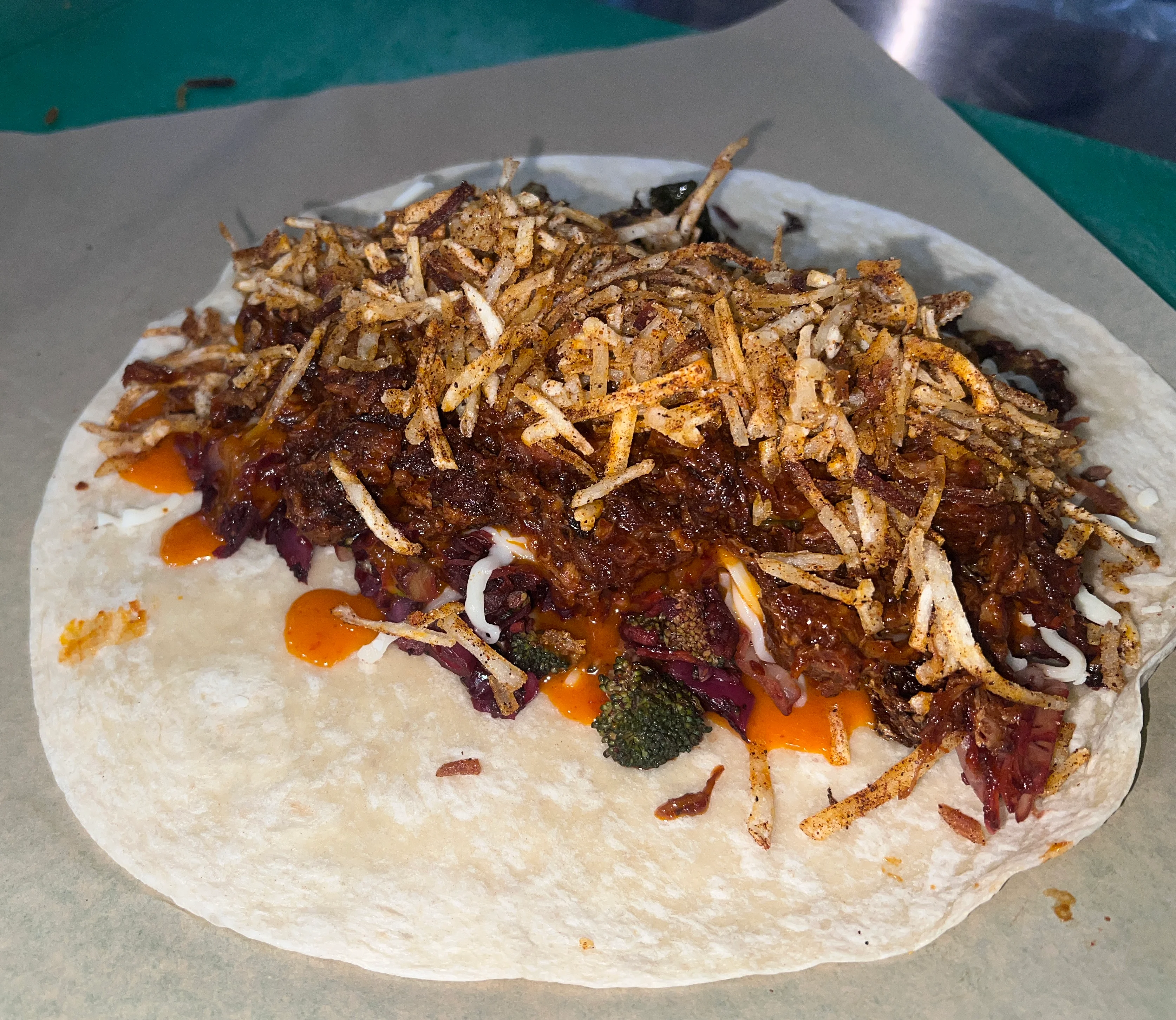 BBQ Pulled pork with power slaw added and firecrack sauce