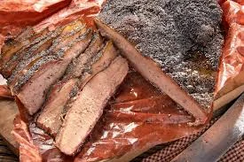 Smoked Texas brisket served with a side of butcher paper