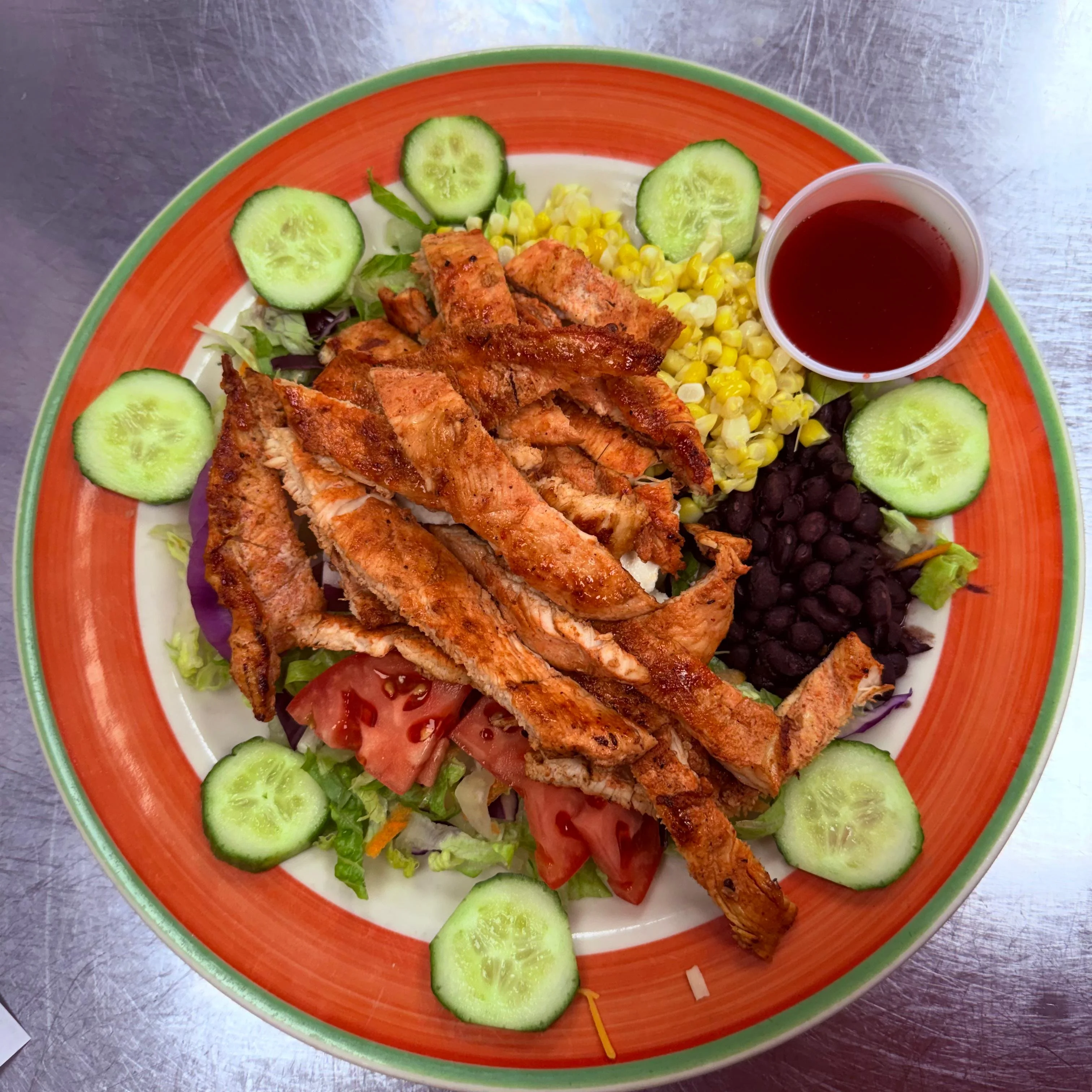 Grilled chicken salad with black beans and corn